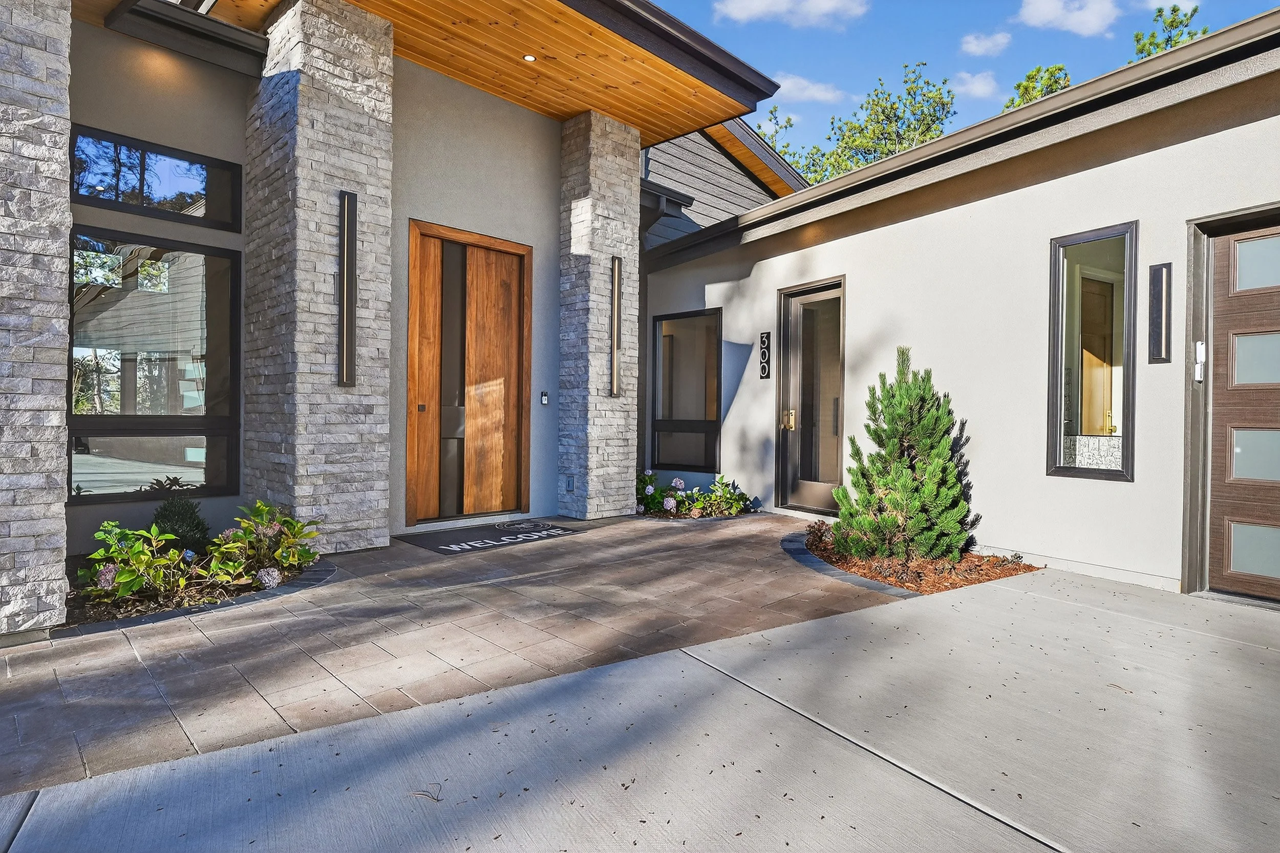3_Colorado Mountain Modern home exterior_stone and contemporary lighting.jpg