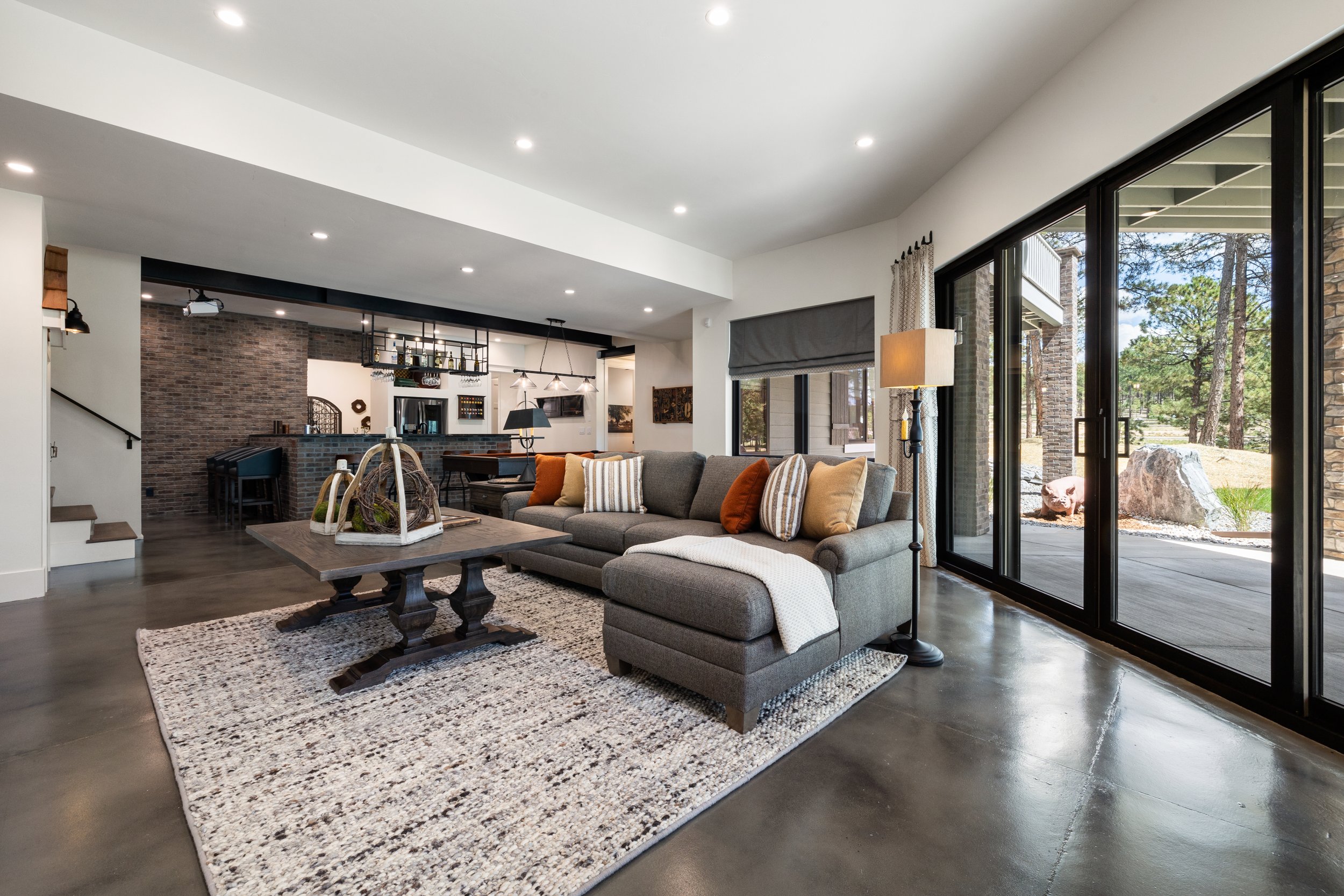 Hillside home walkout with farmhouse rec room.