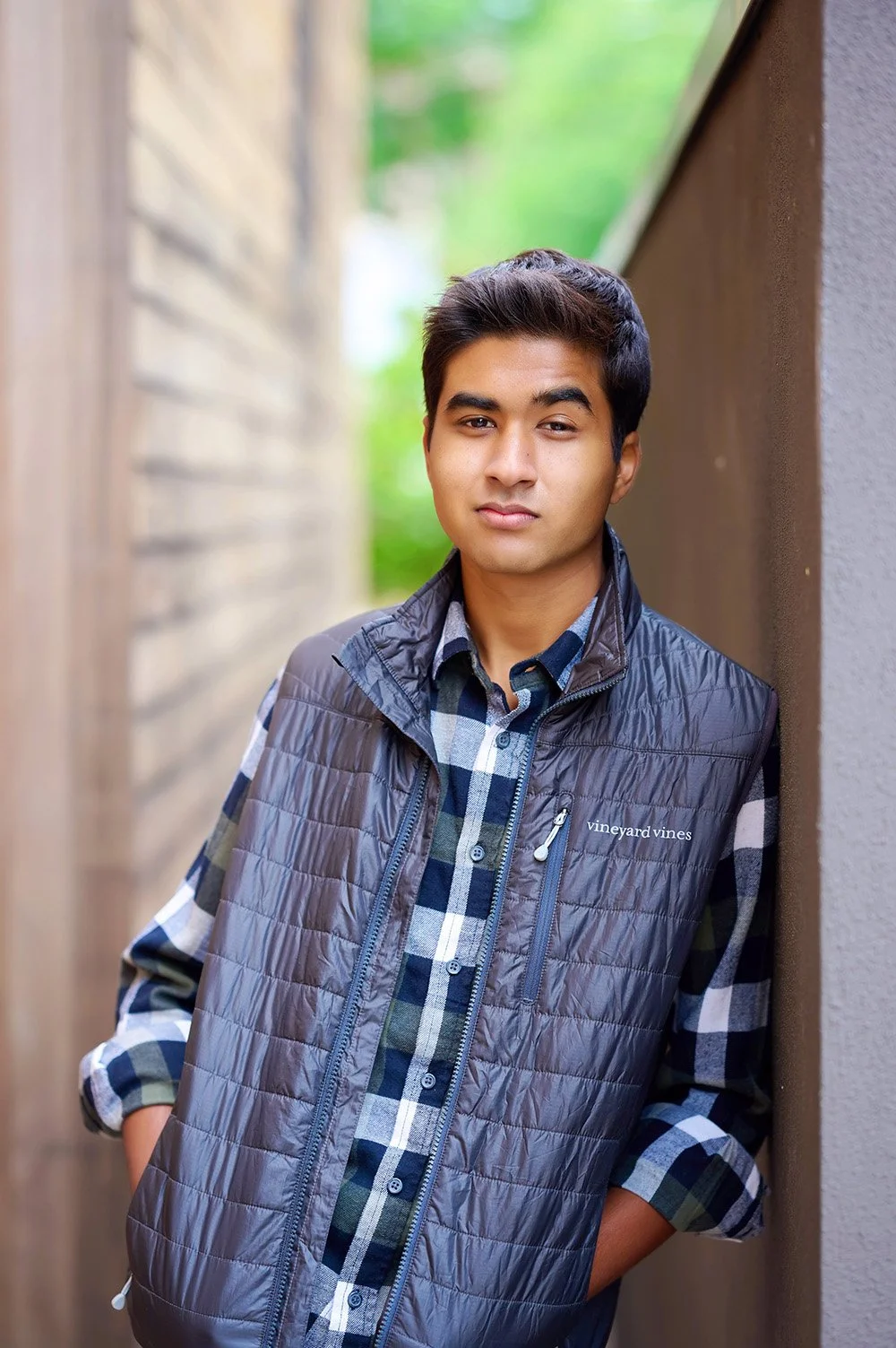 Teen Guy Leaning against wall casual portrait Senior Year