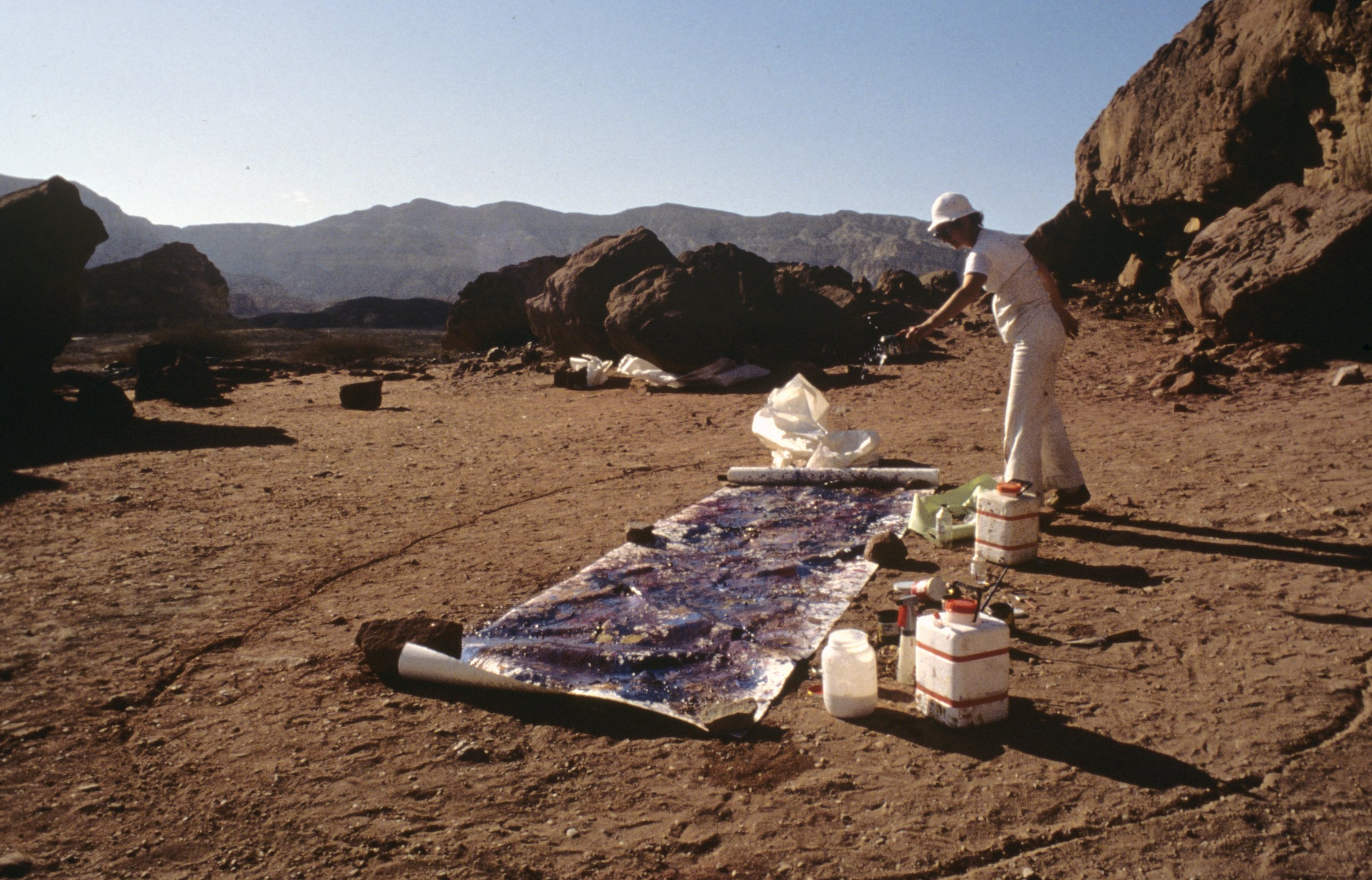 Beth Ames Swartz painting at Solomon's Pillars (Timna Valley, Israel), 1980