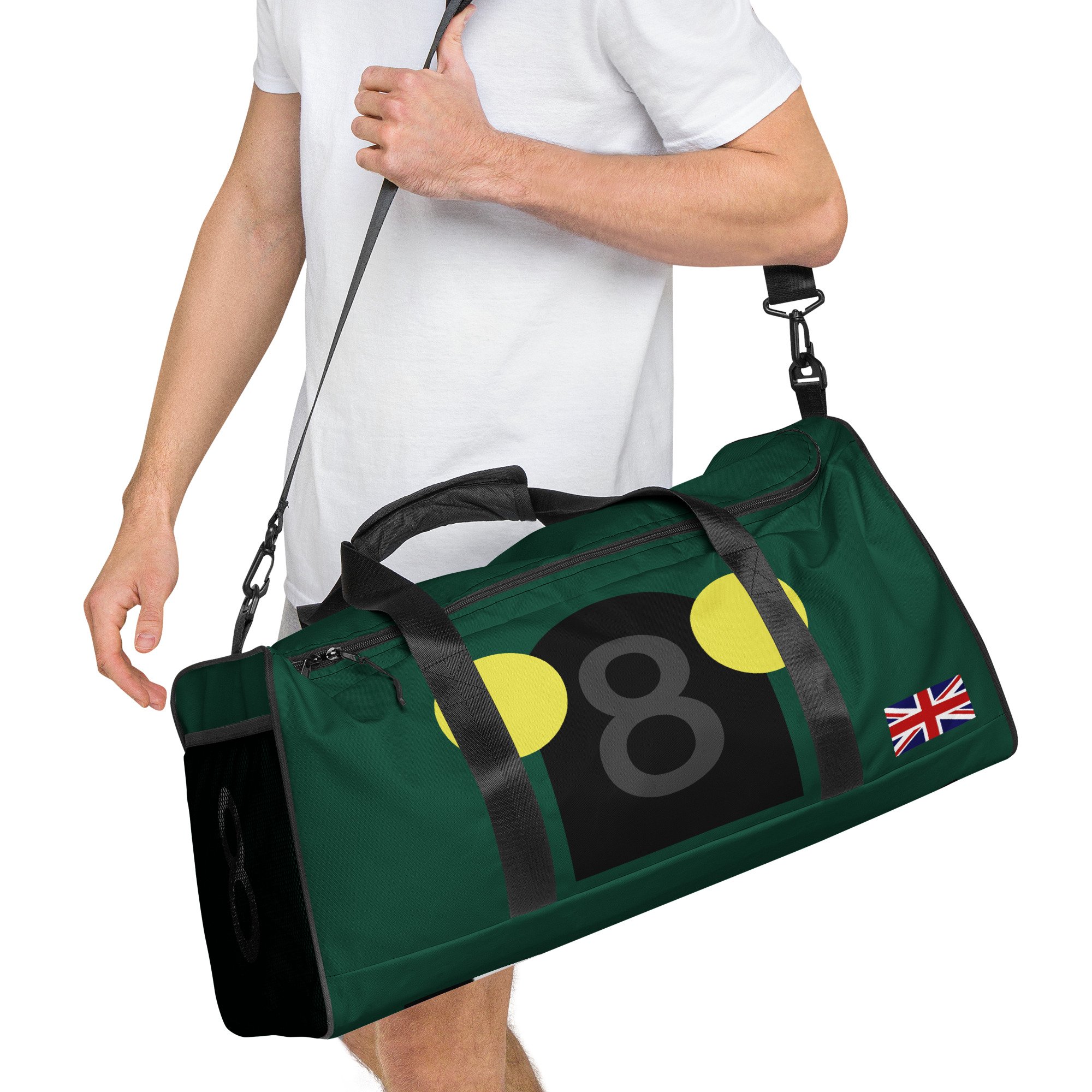 Man carrying a Historic British Blower #8 Tribute Duffle bag, luggage, holdall