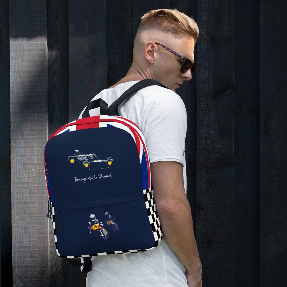 Man carrying Navy Racing at the Revival, chequered flag and union jack backpack rucksack