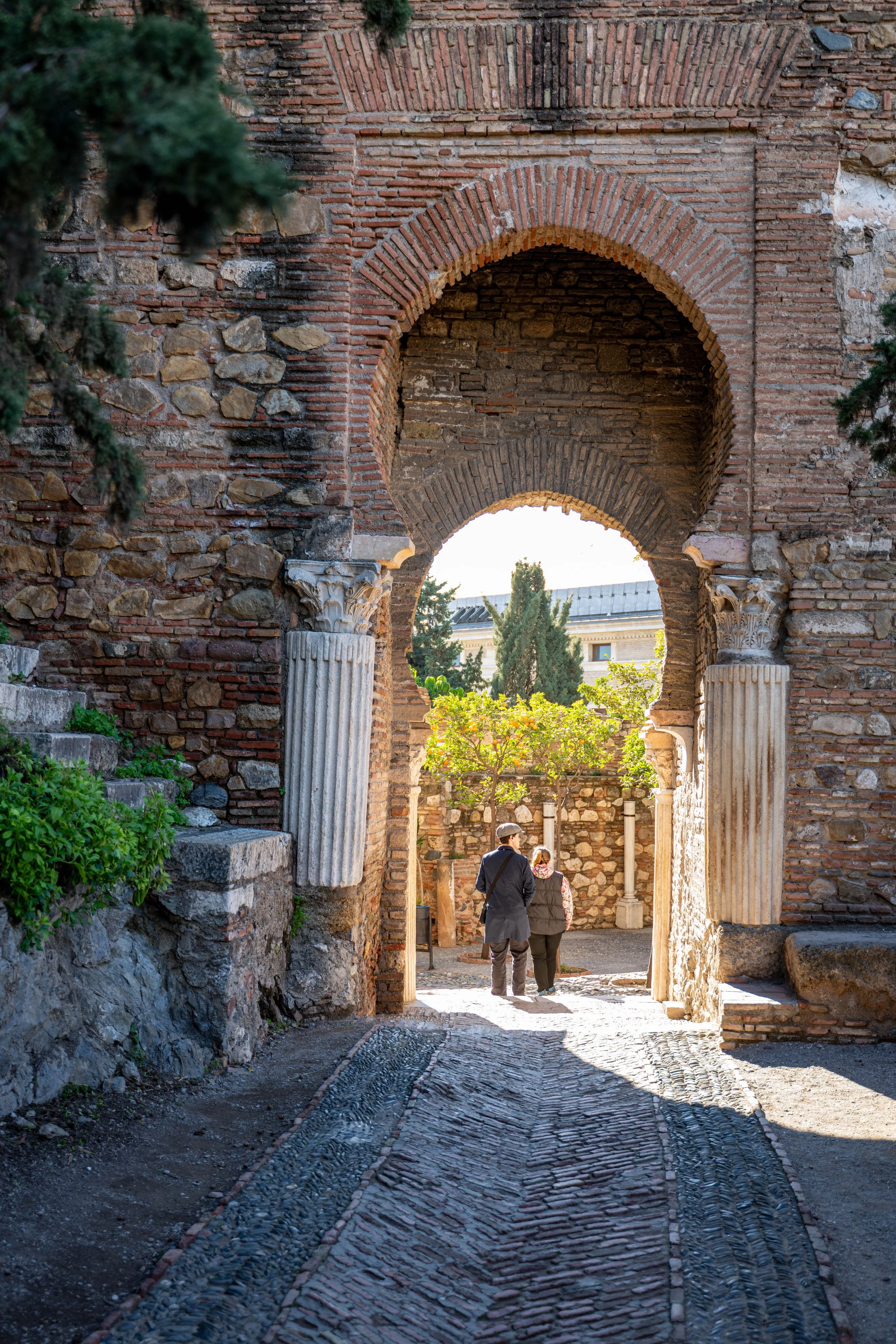 couple framed in arch.jpg