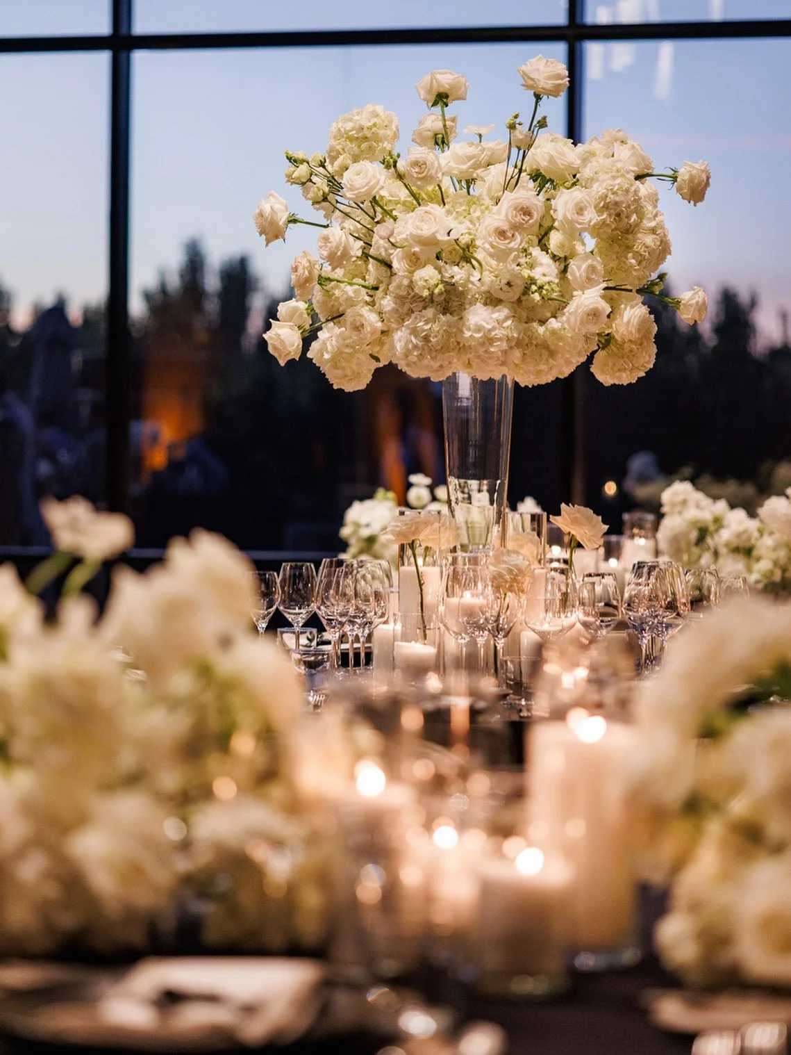 Elevated elegance in every detail.
Are you into all white  florals or do you love a pop of color?

Photography @genevievenislyphoto 
Planning + design @coledrakeevents