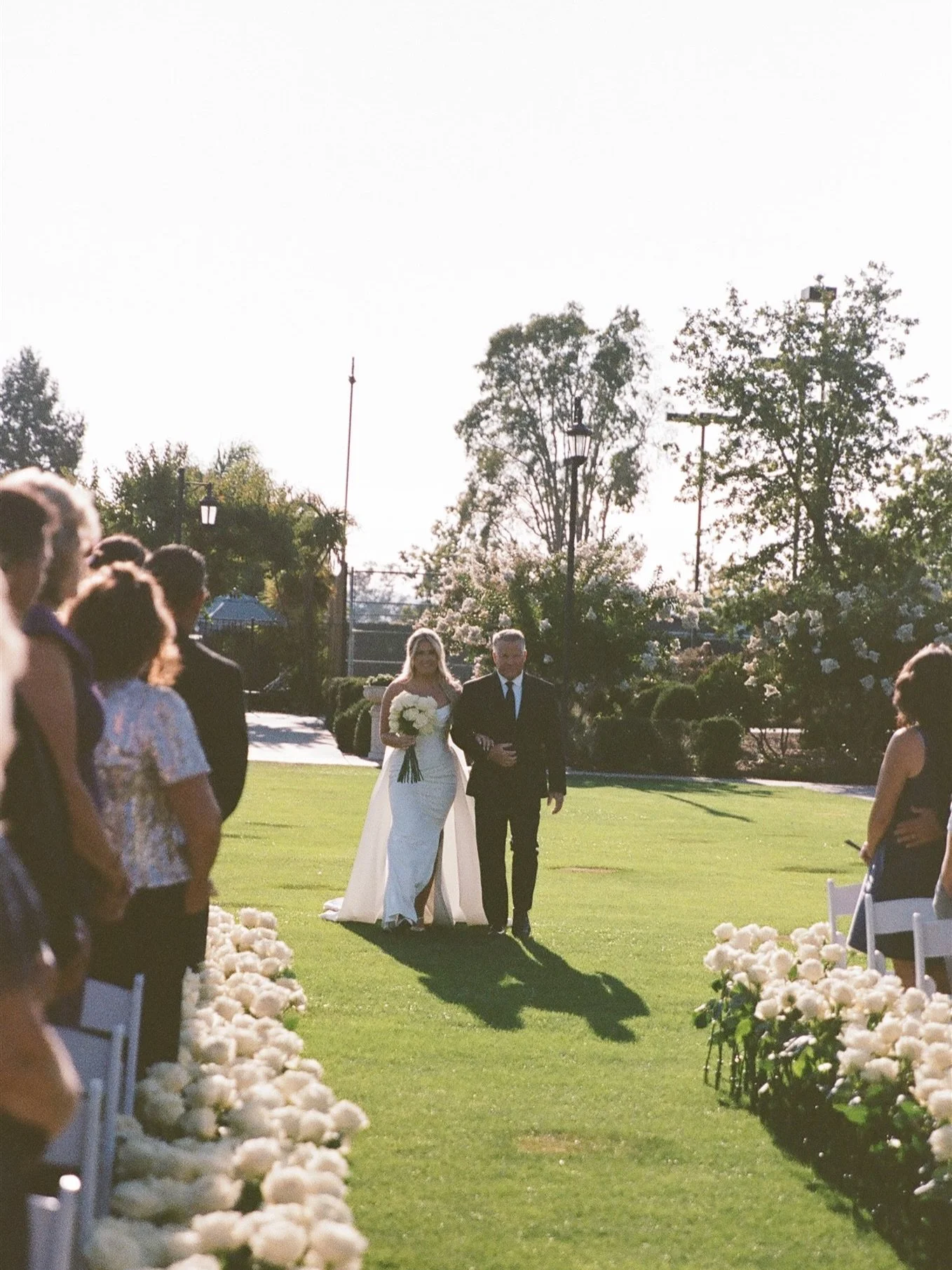 A moment suspended in time 🤍
Petals lining the aisle, sunlight filtering through the garden, and a love that felt both effortless and unforgettable.
Classic. Intentional. Forever in bloom.

#GardenWedding #TimelessFlorals #WhiteOnWhite #CeremonyMagi