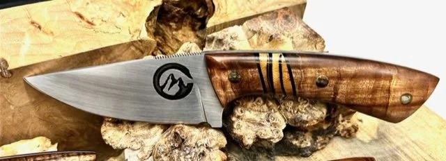 Custom hunting knife with ancient mammoth tusk
