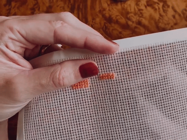 GIF tutorial on how to needlepoint with the continental stitch