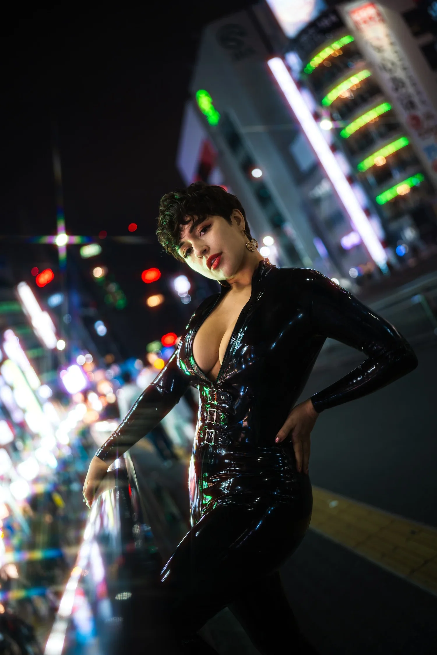 Fashion portrait of a woman against colorful neon lights during a professional Tokyo night photoshoot