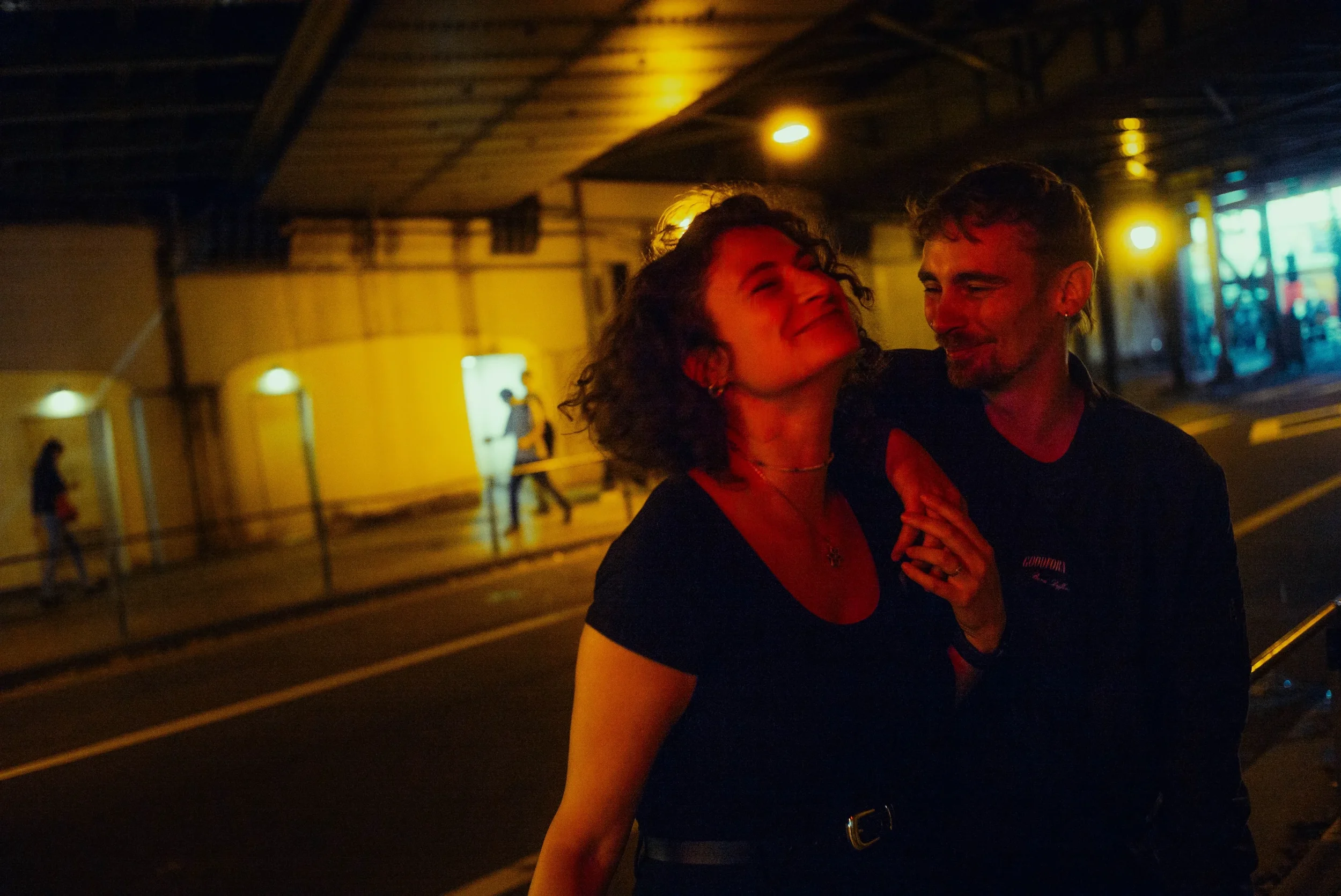 Couple portrait on a quiet Tokyo street during an evening photoshoot
