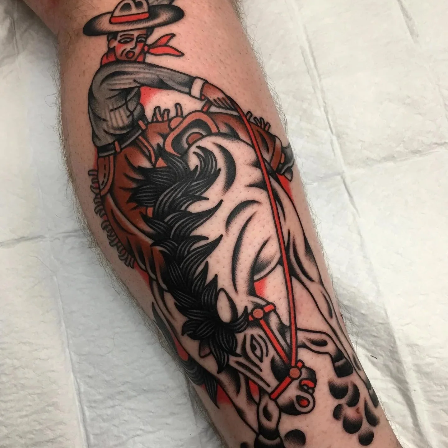 traditional tattoo cowboy bucking horse