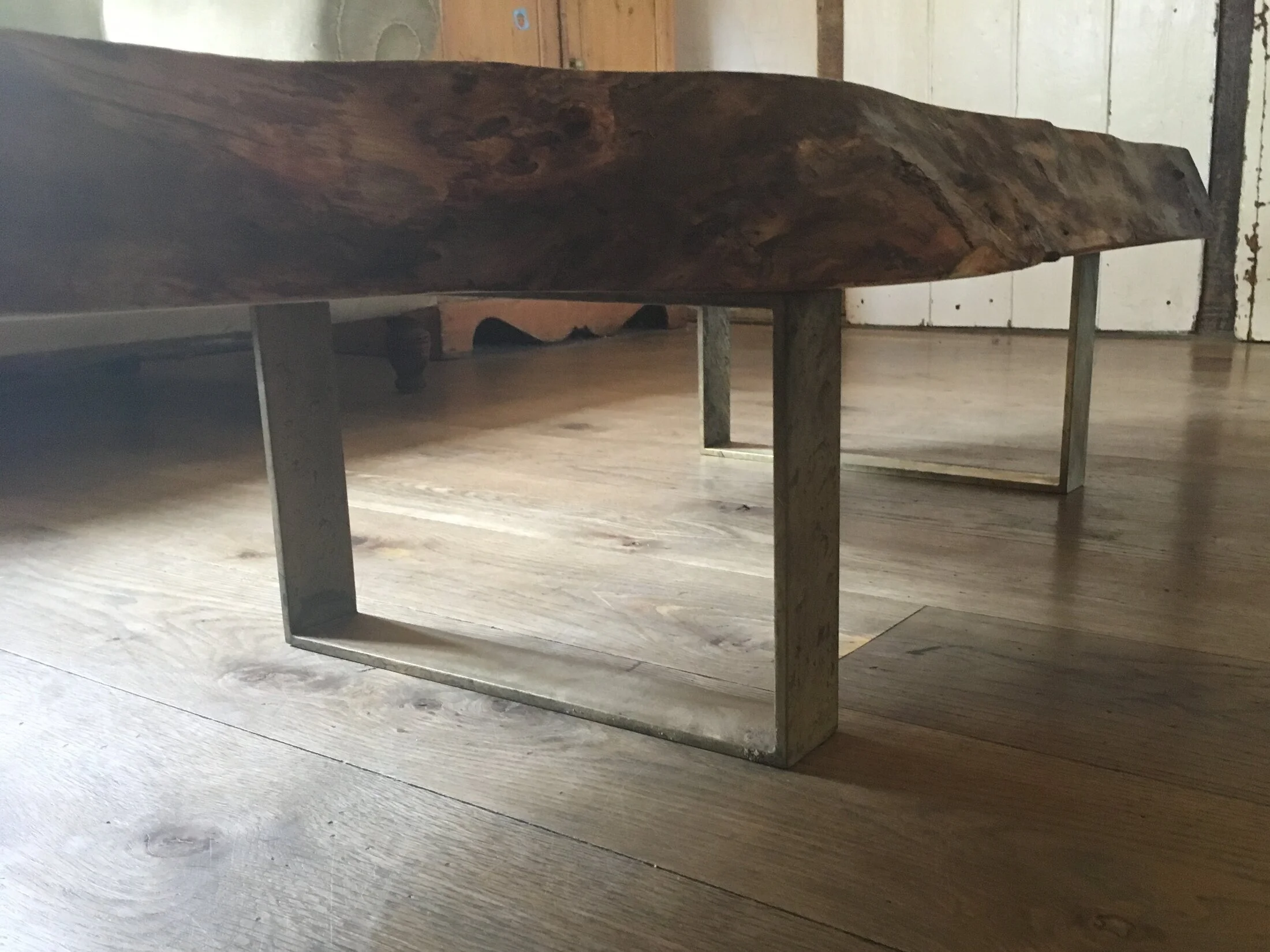 bronze legs on elm live edge table top