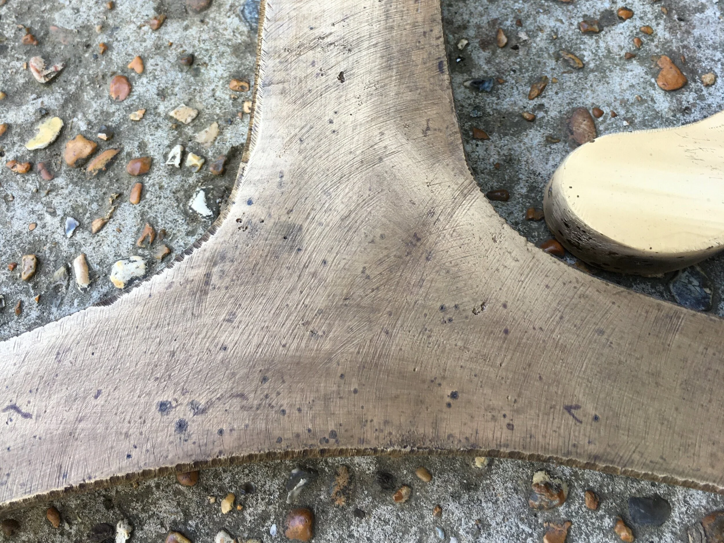 wishbone close up brass brushed detail