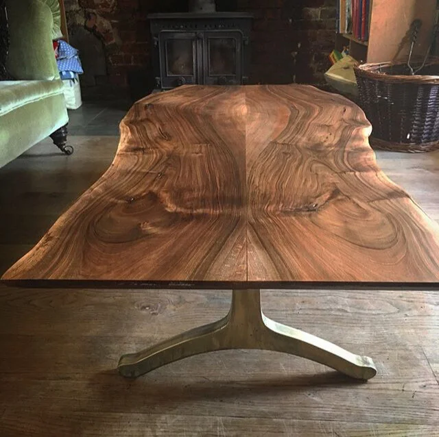 Live Edge English Walnut Coffee Table Sitting on Antiqued Bronzed Wishbone Legs