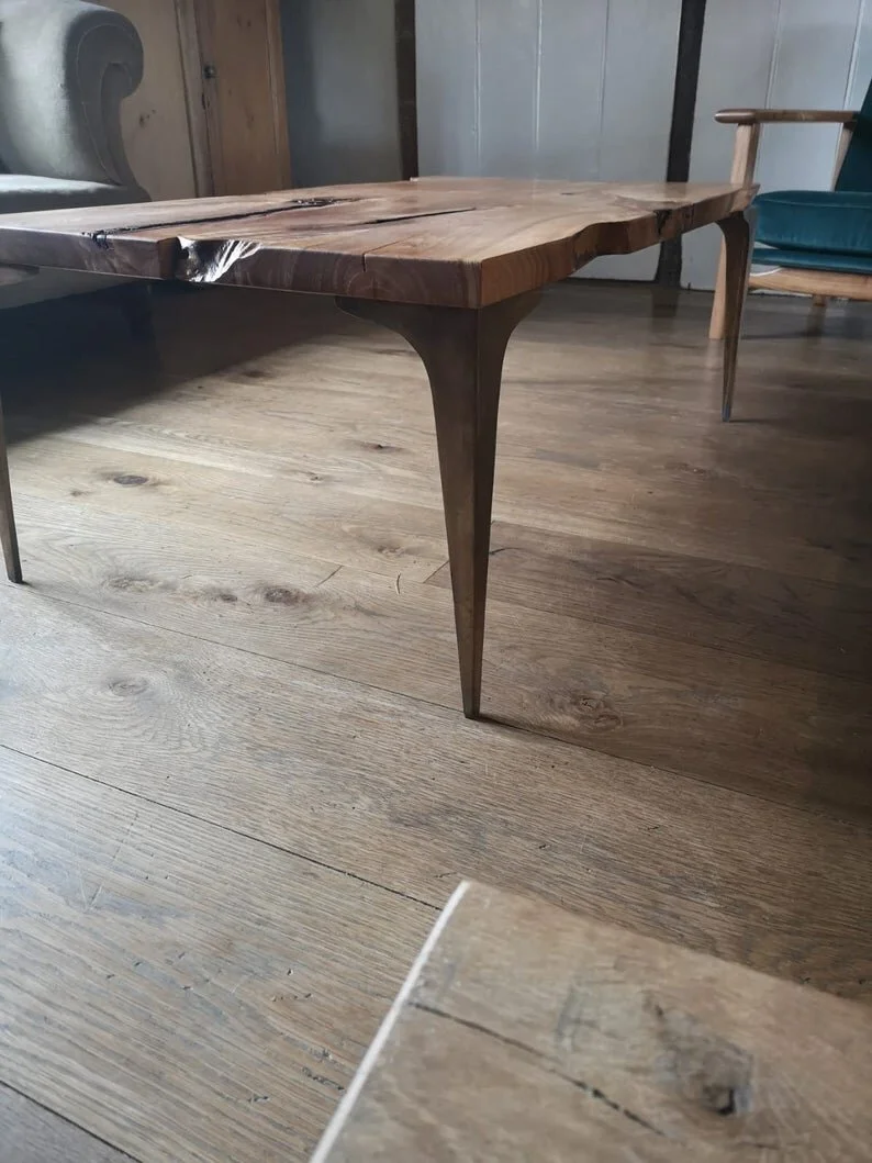 Book Matched English Elm Coffee Table on Bronze Stiletto legs
