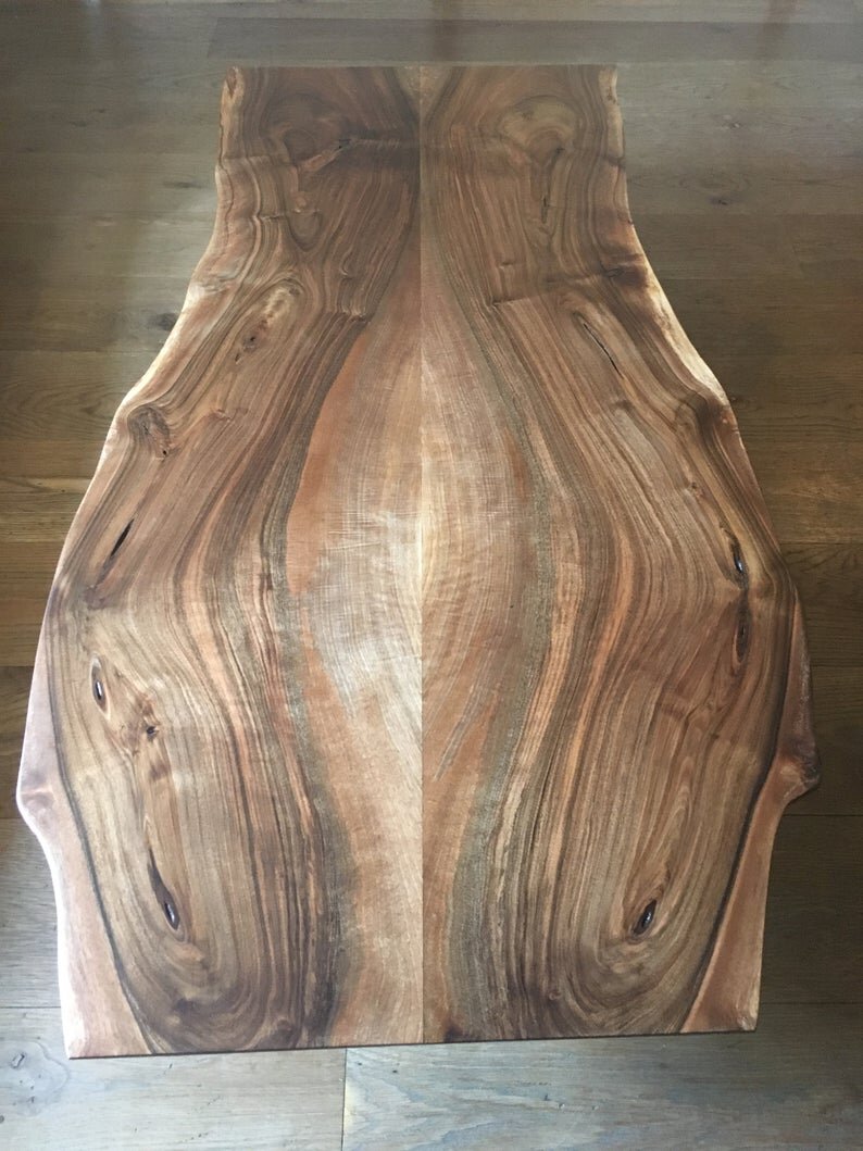 Live Edge English Walnut Coffee Table Sitting on Antiqued Bronzed Wishbone Legs
