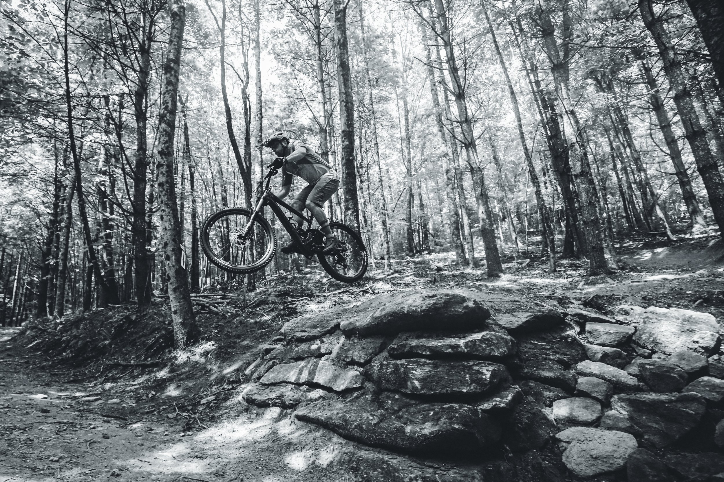 Josh Whitmore rides the road gap on Hemlock Epoch at Kanuga