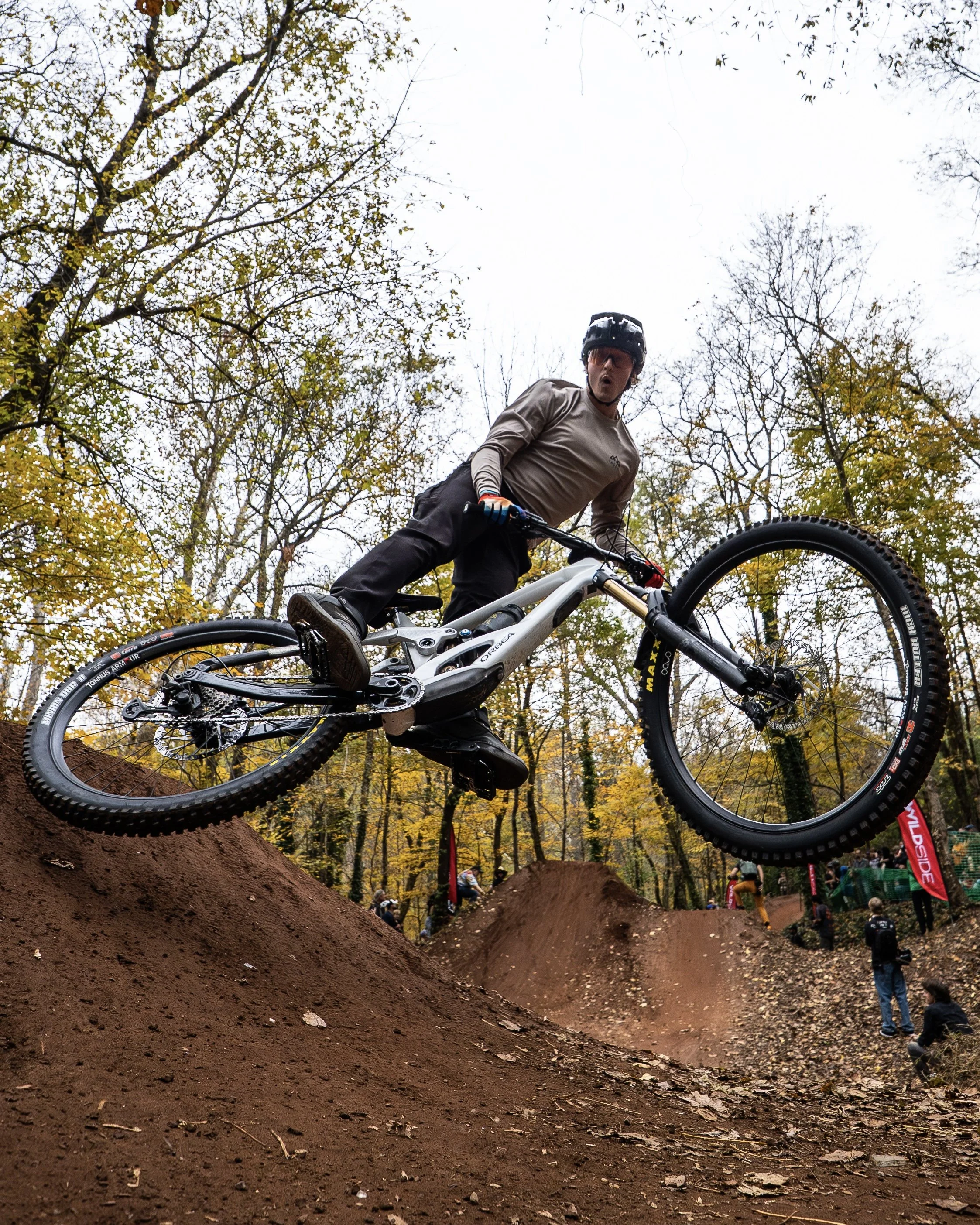 Allen Messersmith, mountain bike skills coach for MTB Skills Factory rides a dirt jump with style