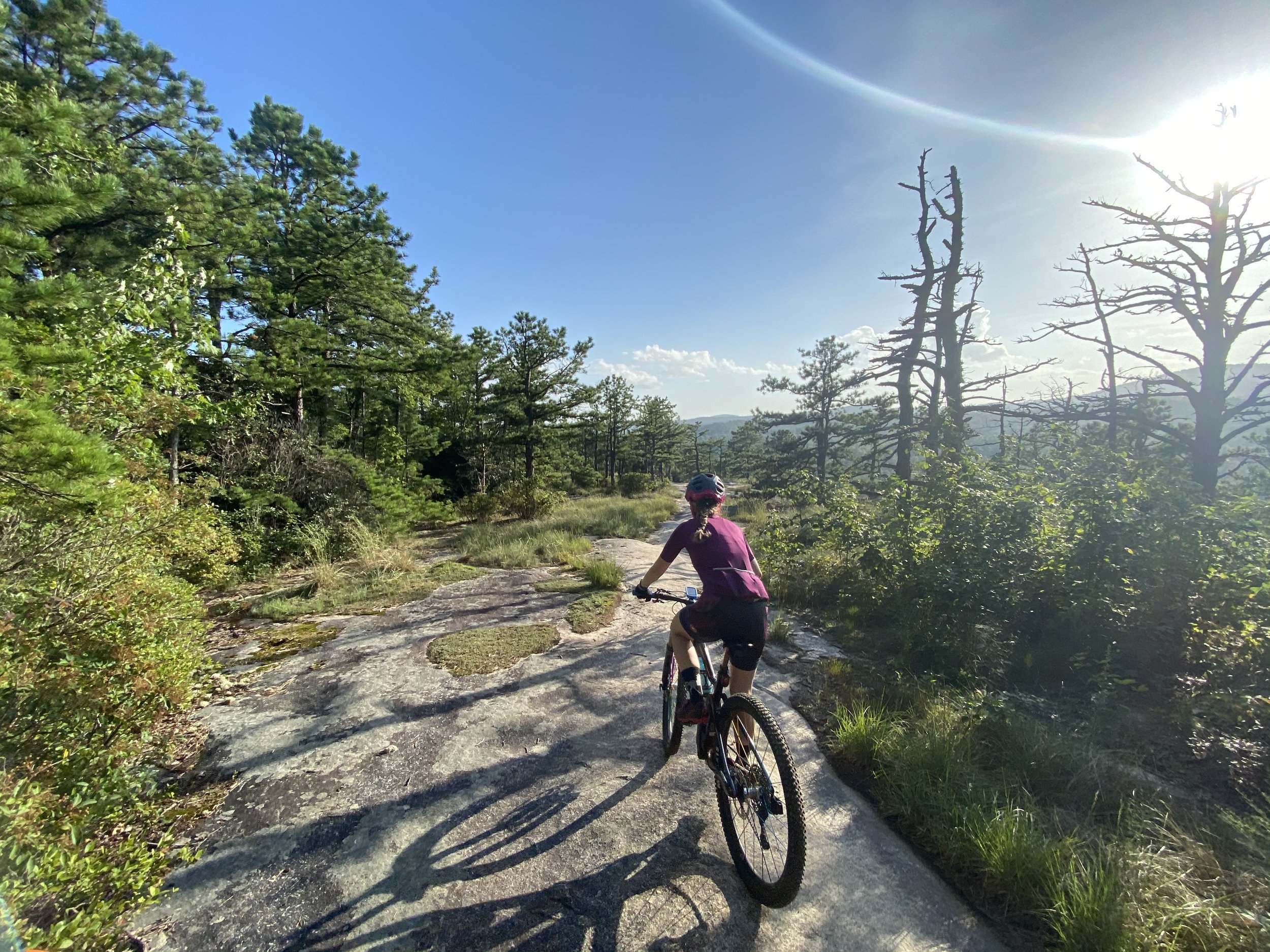 Mountain Biker rides Big Rock Trail in Dupont on a guided ride with MTB Skills Factory