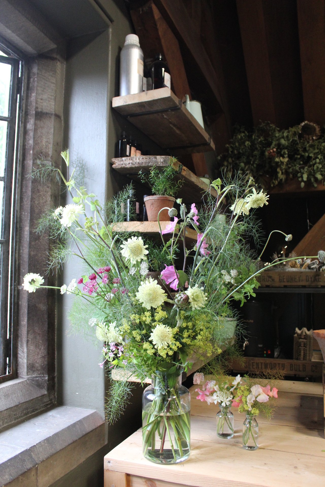 Loose-Garden-Flowers-Gathered-in-Glass-Vases..jpeg