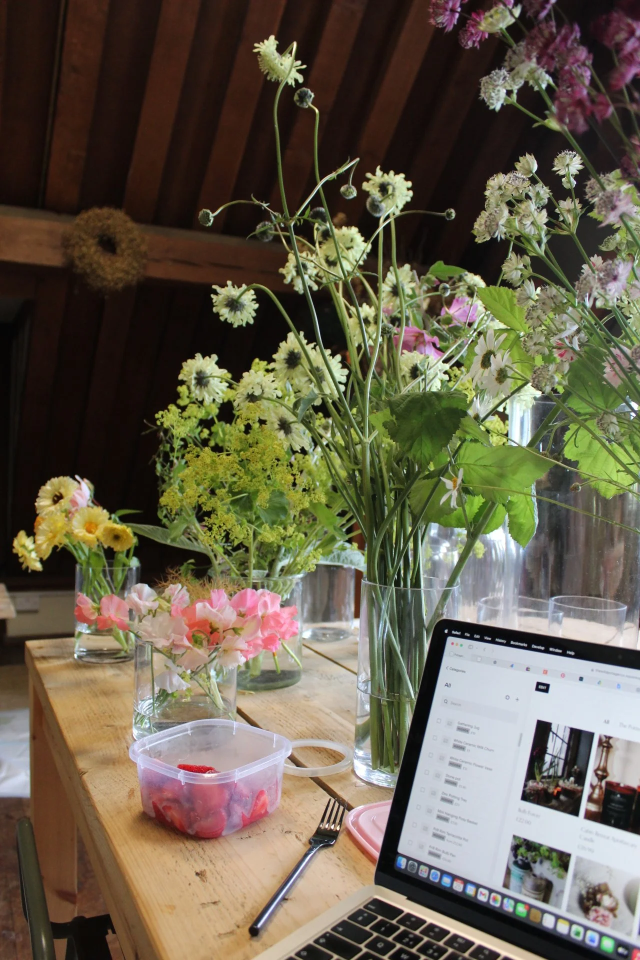 Fresh-Wedding-Flowers-Gathered-Across-the-Workbench..jpeg