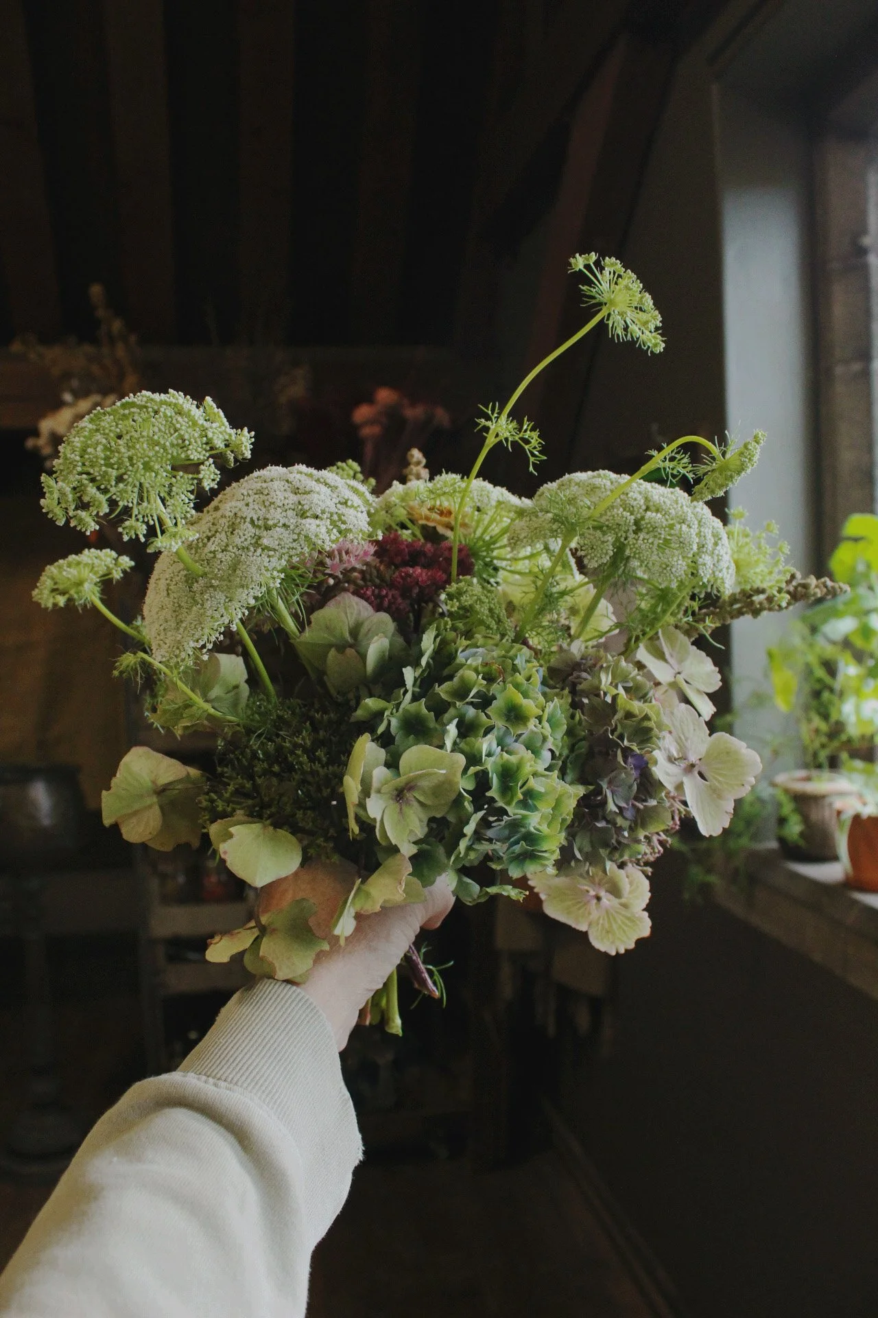 A hand-tied arrangement of flowers and foliage grown and gathered from the potager.