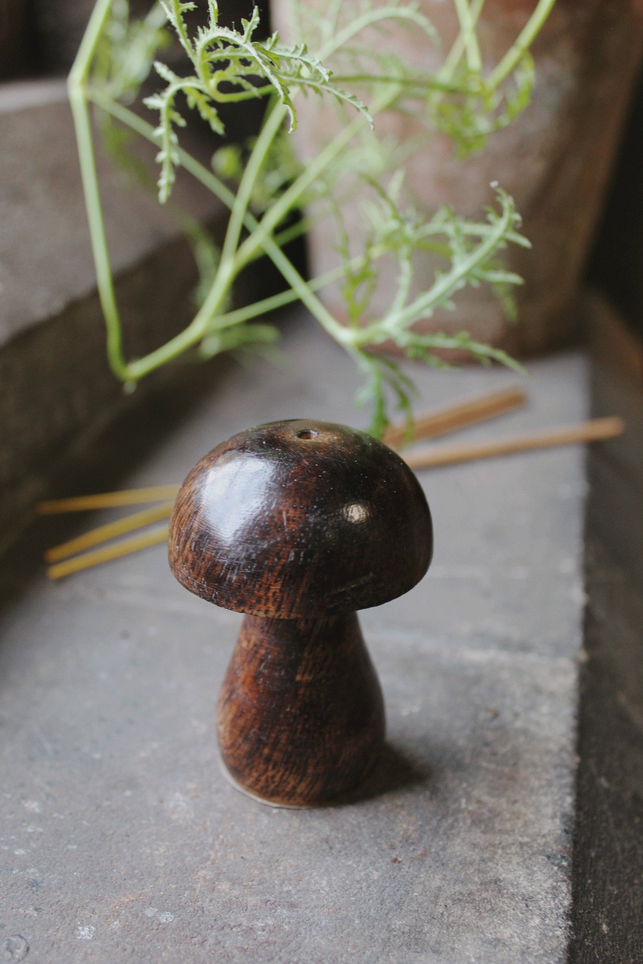 Classic wooden incense holder with incense sticks