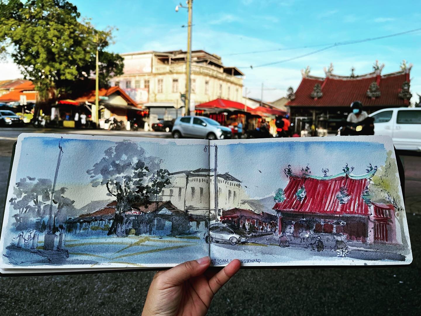 Double page spread in the morning. Just getting on with it before breakfast. The streets was still quiet. The Kuan Yin Temple is barely open. Sketch done in 1 hour 20 minutes. #georgetownpenang #watercoloursketch #pleinairpainting #sketchingonlocatio