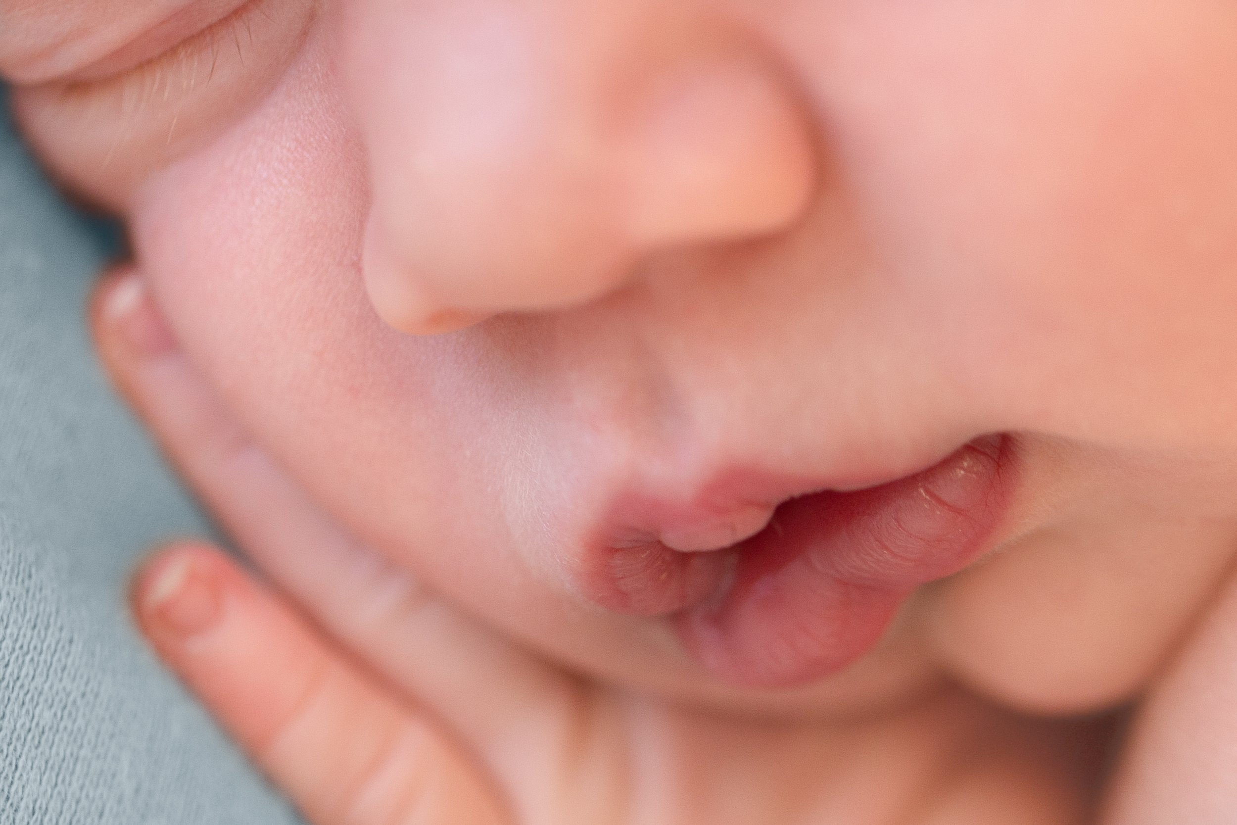 close up of newborn baby lips