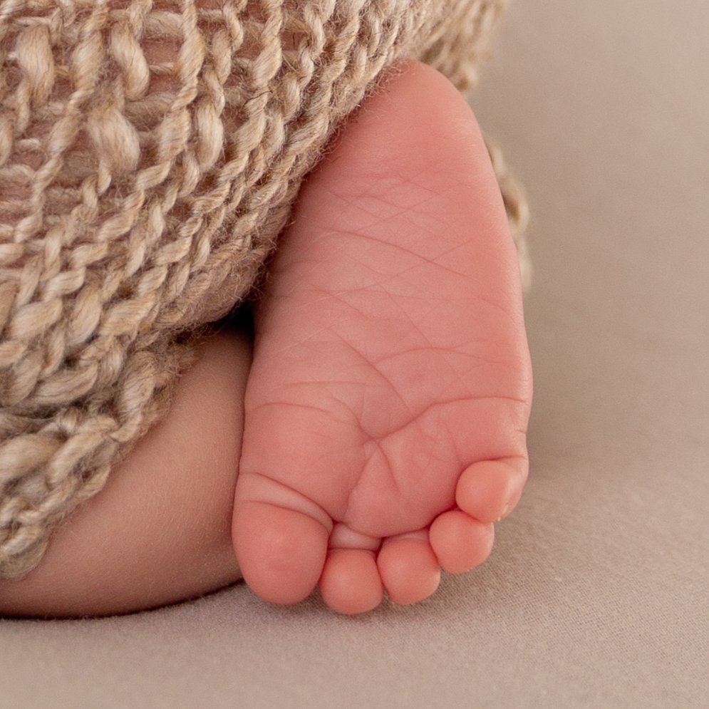 close up picture of newborn baby foot
