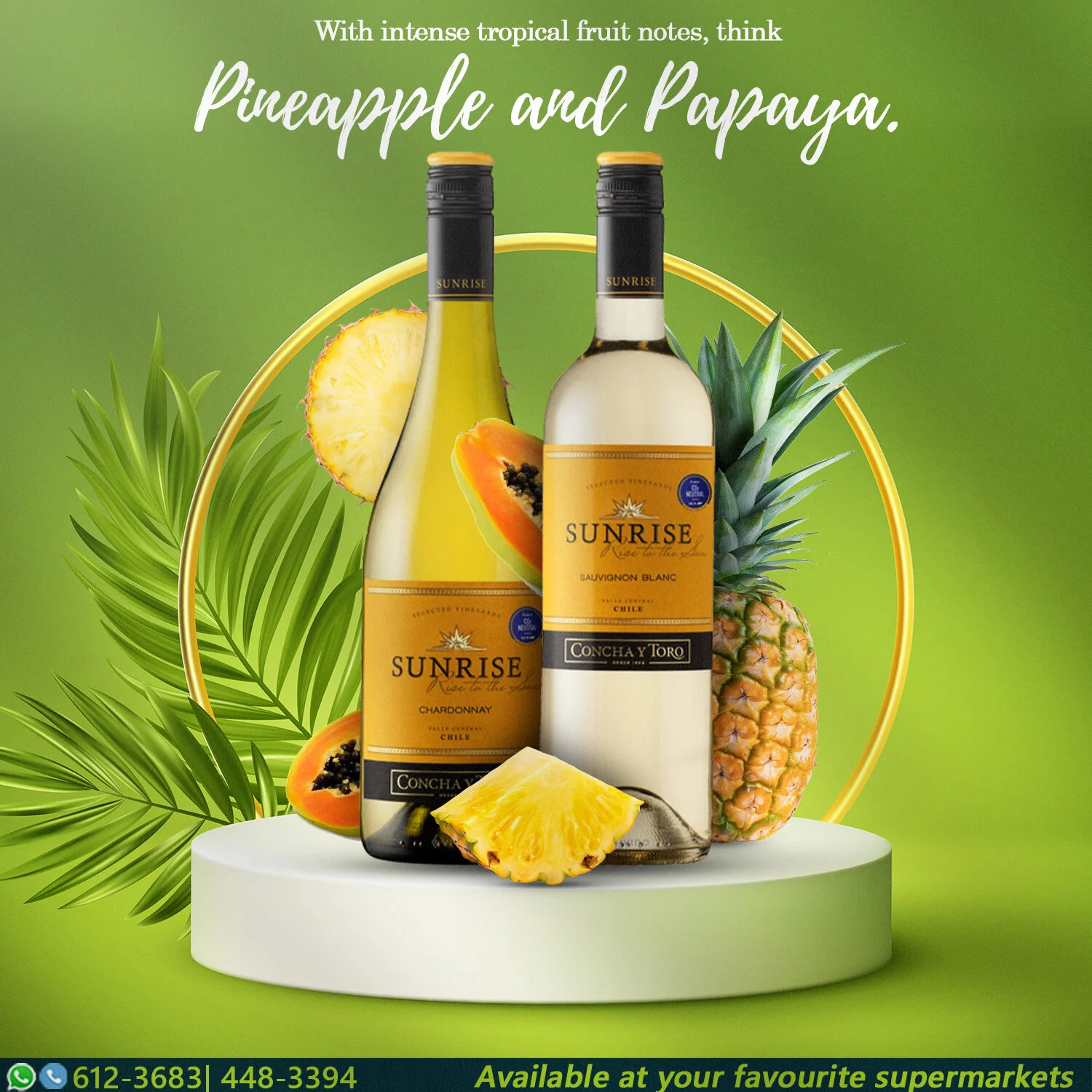 Two bottles of Sunrise wine, one Chardonnay and one Sauvignon Blanc, surrounded by tropical fruits including pineapple, papaya, and pineapple leaves on a white platform against a green background with yellow circle decoration.