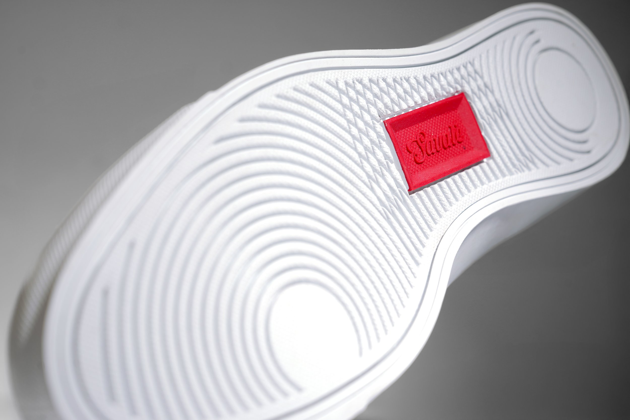Savalé footwear sole detail shot against white studio background — product photographer Los Angeles