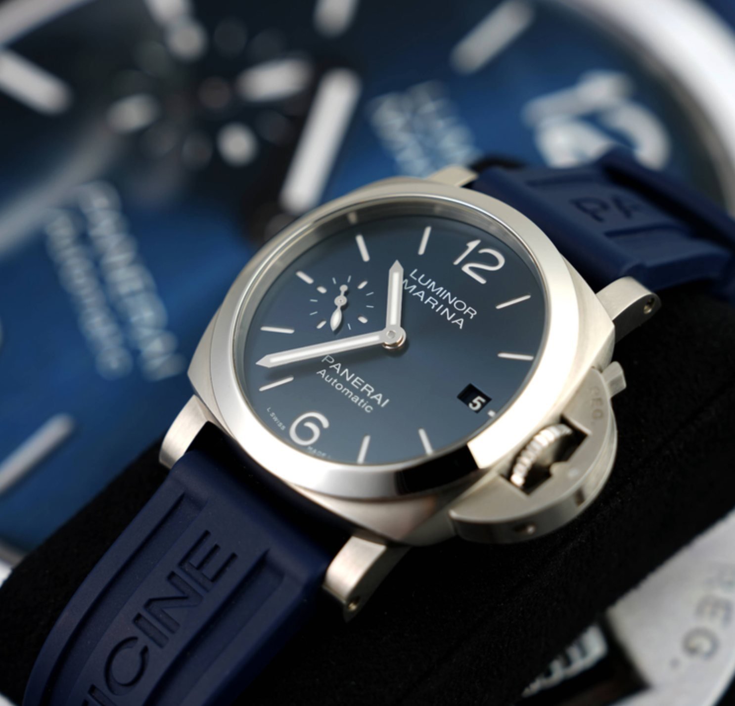 Panerai luxury watch in controlled directional light with shallow depth of field, ecommerce product photography