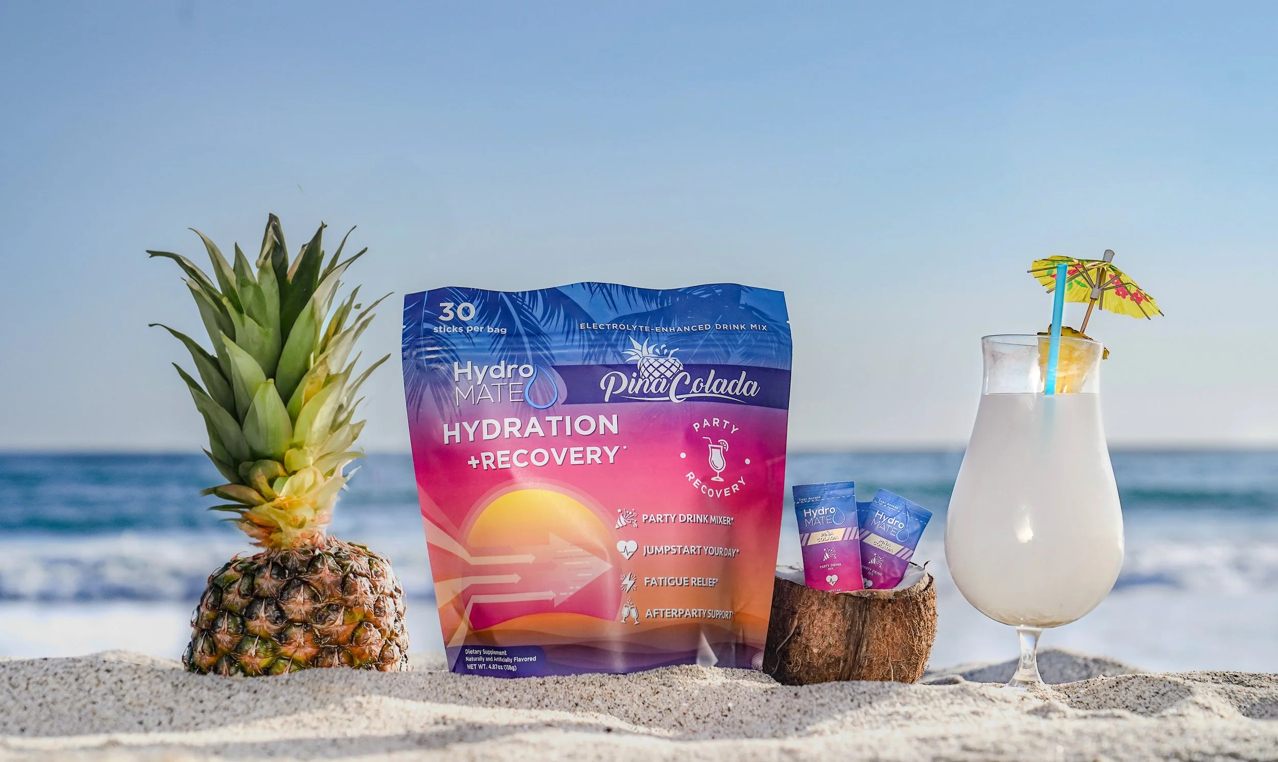 HydroMATE beach campaign photography for a lifestyle beverage brand
