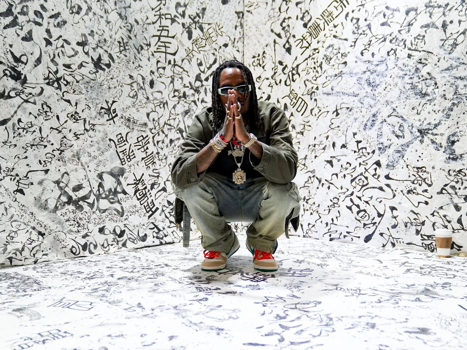 A$AP Rocky photographed inside an immersive black-and-white calligraphy installation at ComplexCon Long Beach