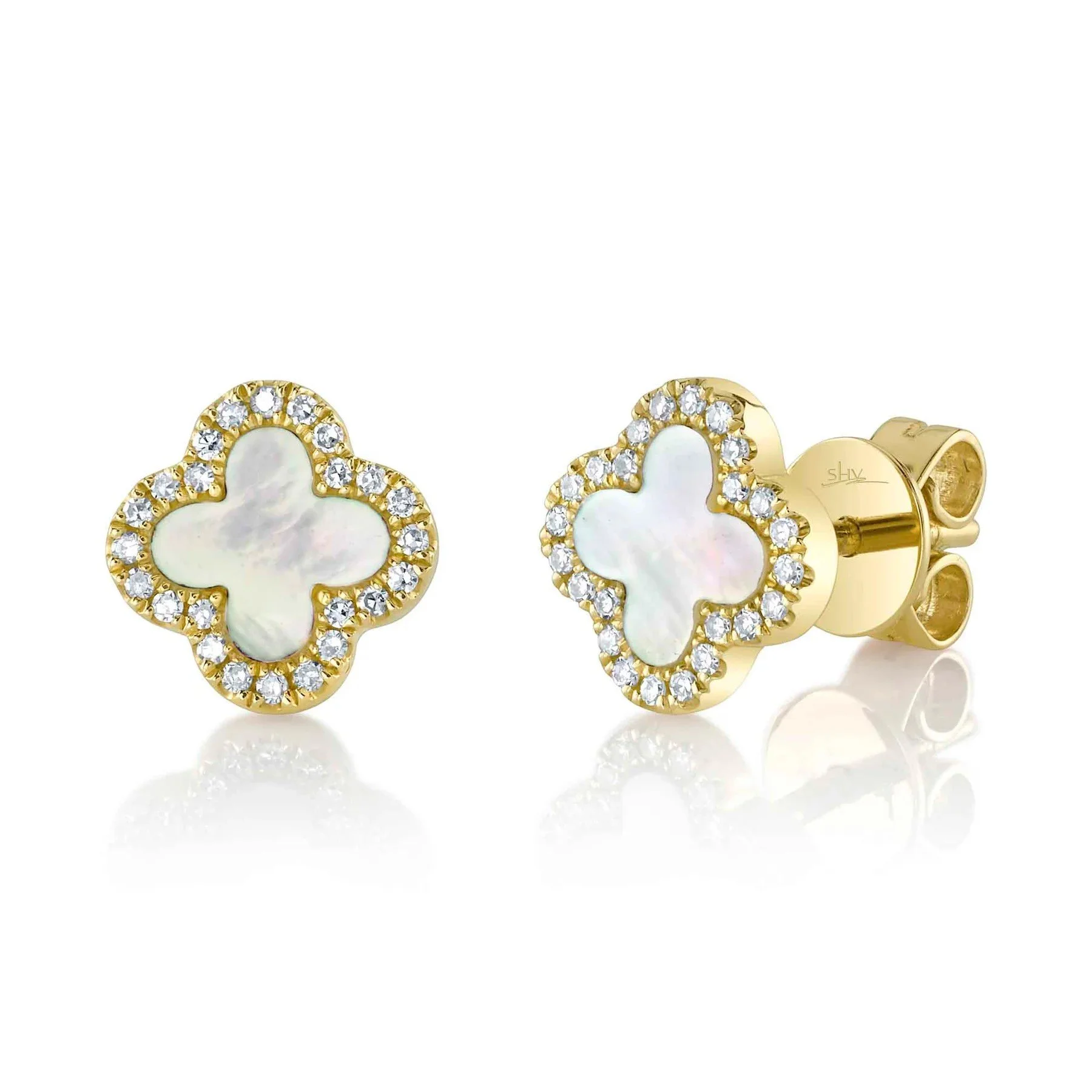 Gold luxury jewelry earrings with diamond -  product photography Los Angeles