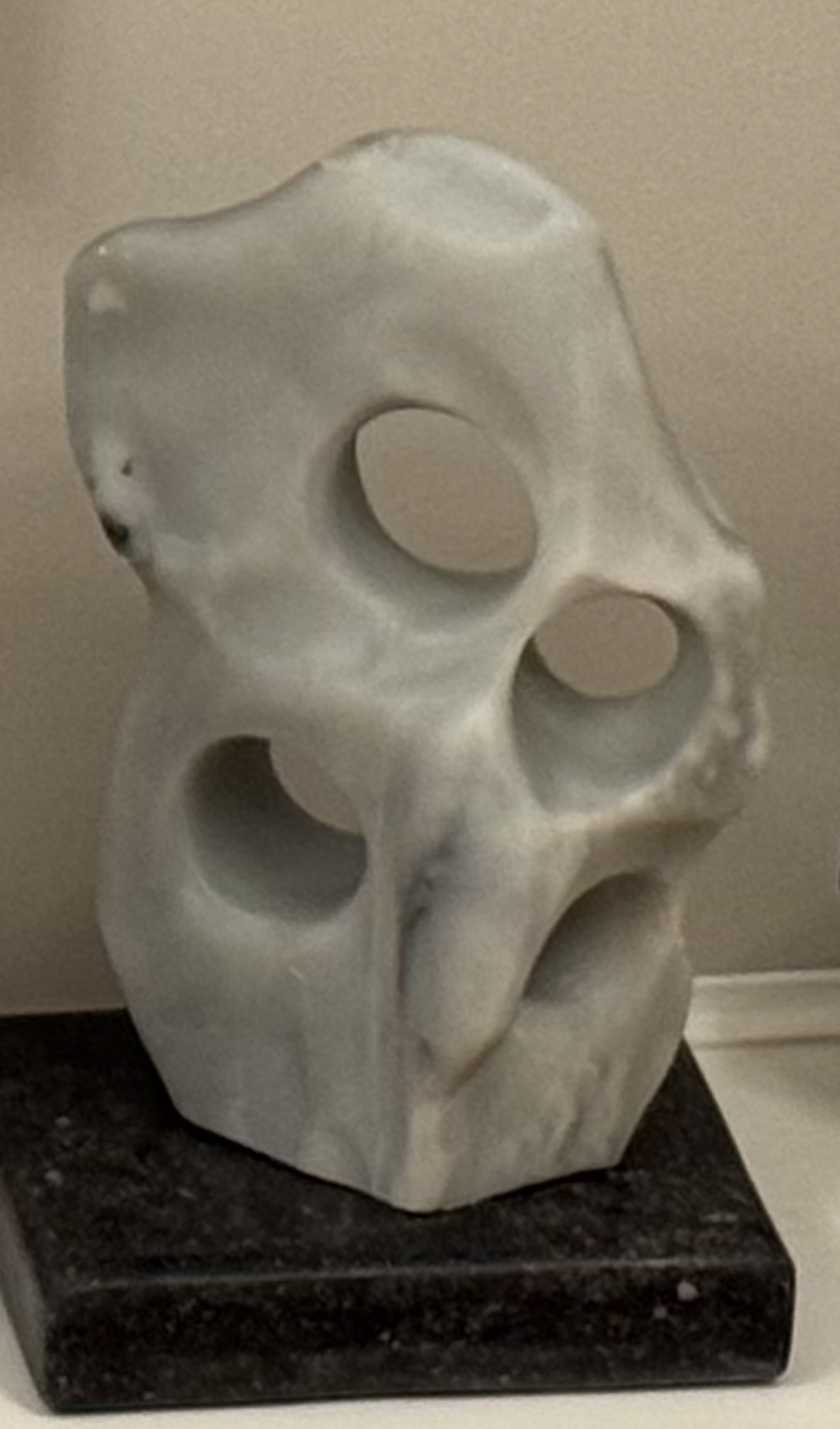 Abandoned, 16" H x 8" W x 4" D, grey mist alabaster mounted on a black soapstone base