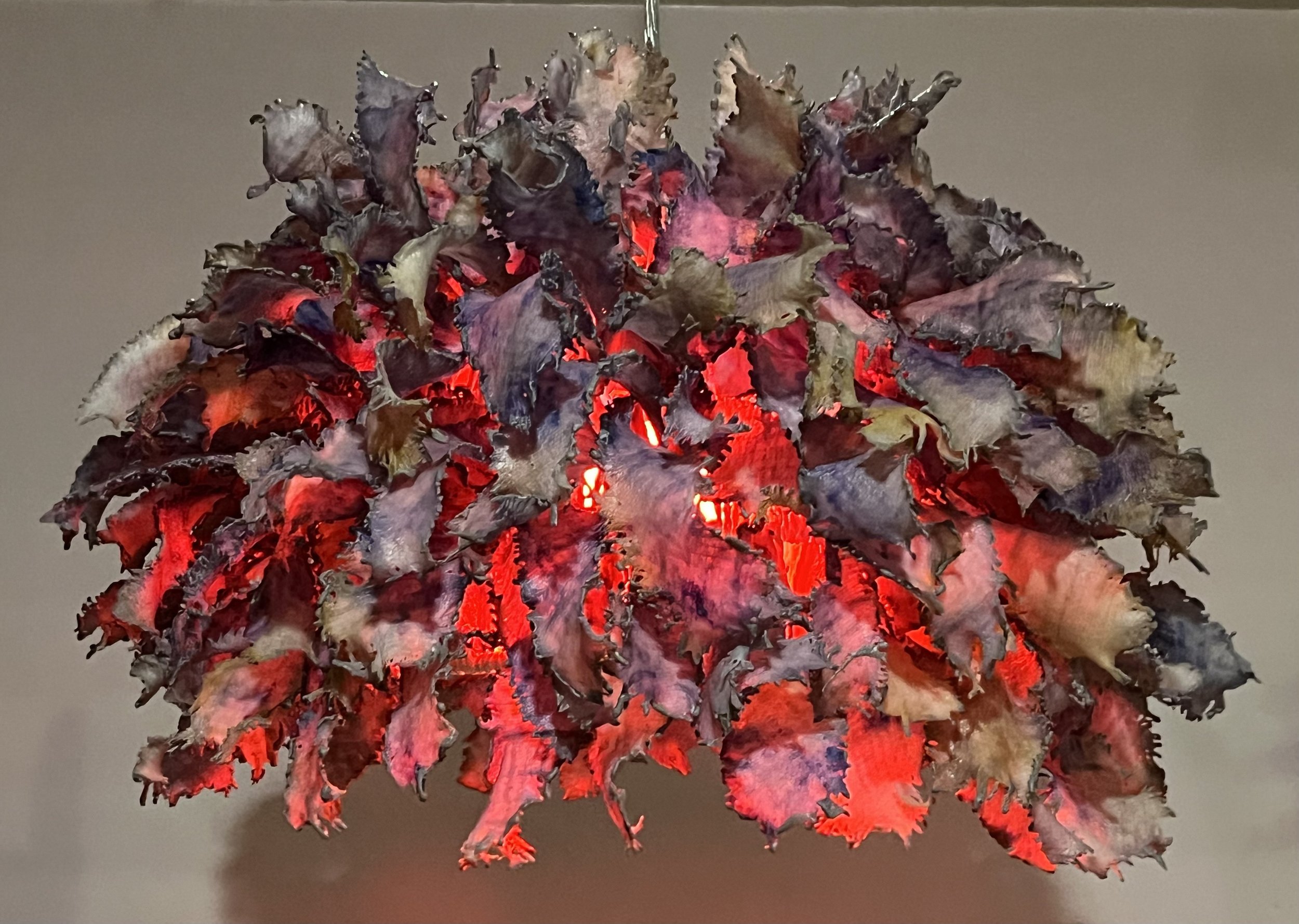  Dot Bergen   
 Fusion   
12" x 18" 
Encaustic and Fiber Sunlight is the basis for all life on earth. The light and heat emitted from the sun is the result of solar fusion which occurs at the core of the star. This process warms our planet and drives