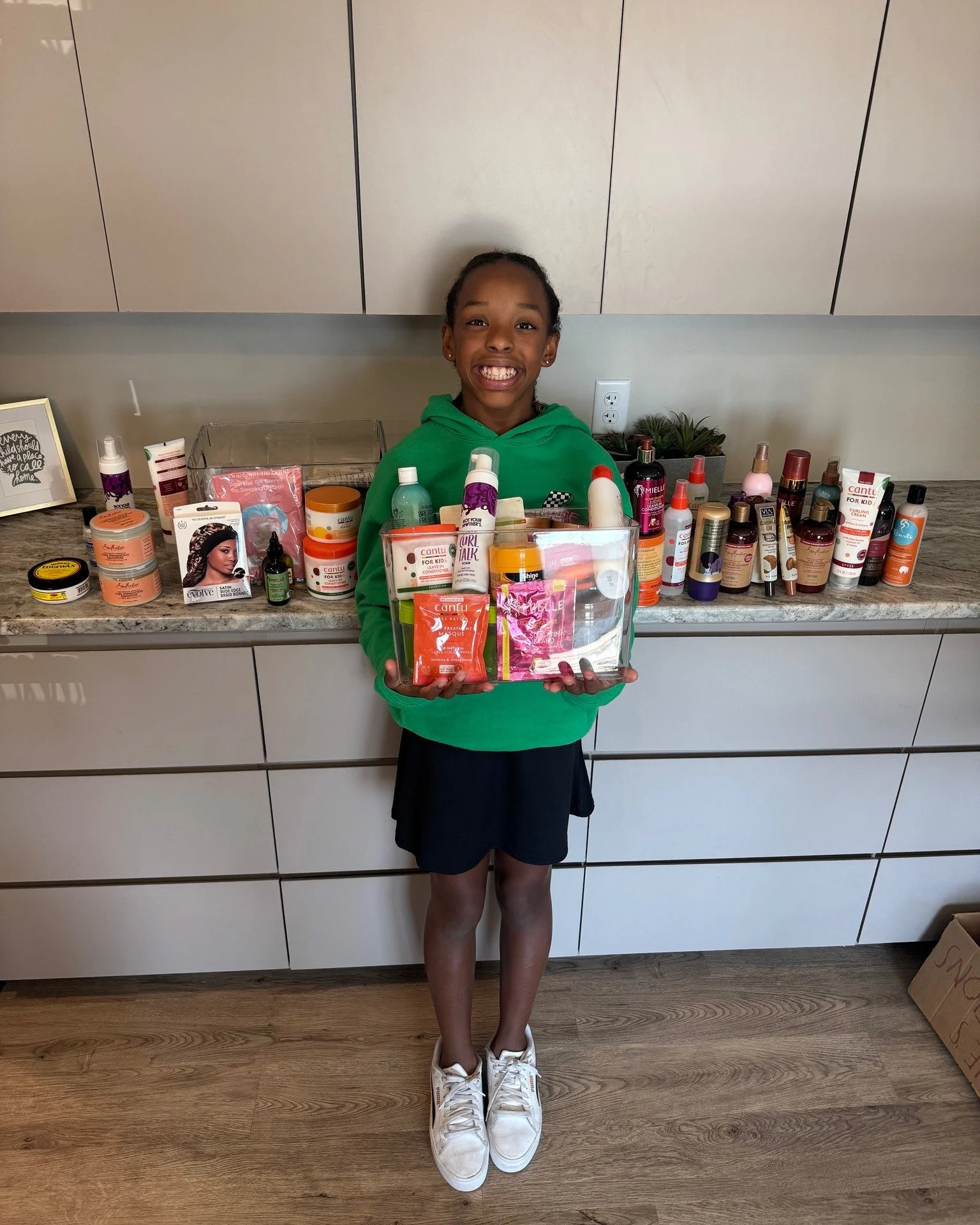 Imagine arriving in a new family with nothing familiar around you. You want to care for your beautiful, natural curls the way you always have, yet the products you rely on are missing. Something as simple as hair care suddenly feels like one more rem