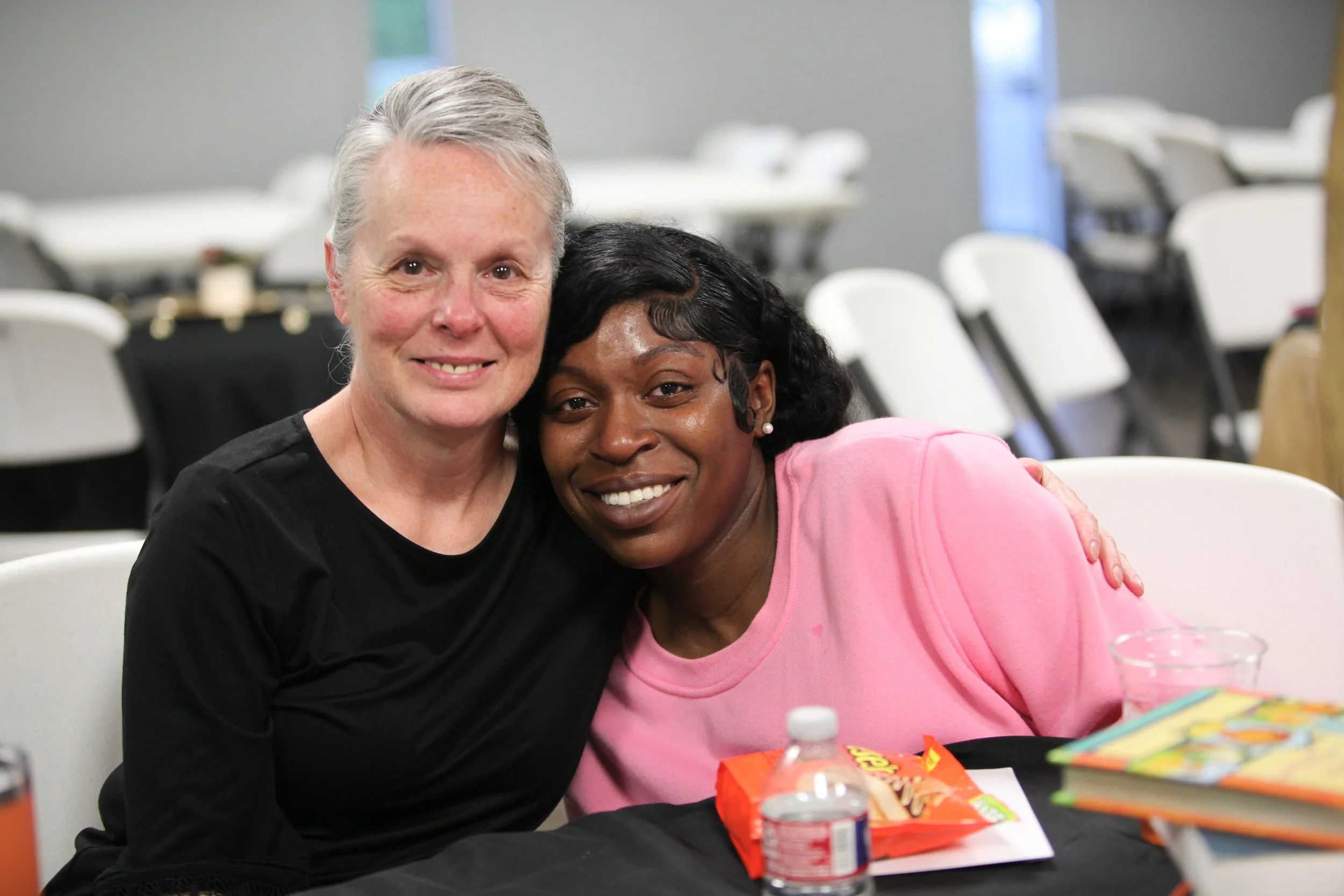 Two happy volunteers