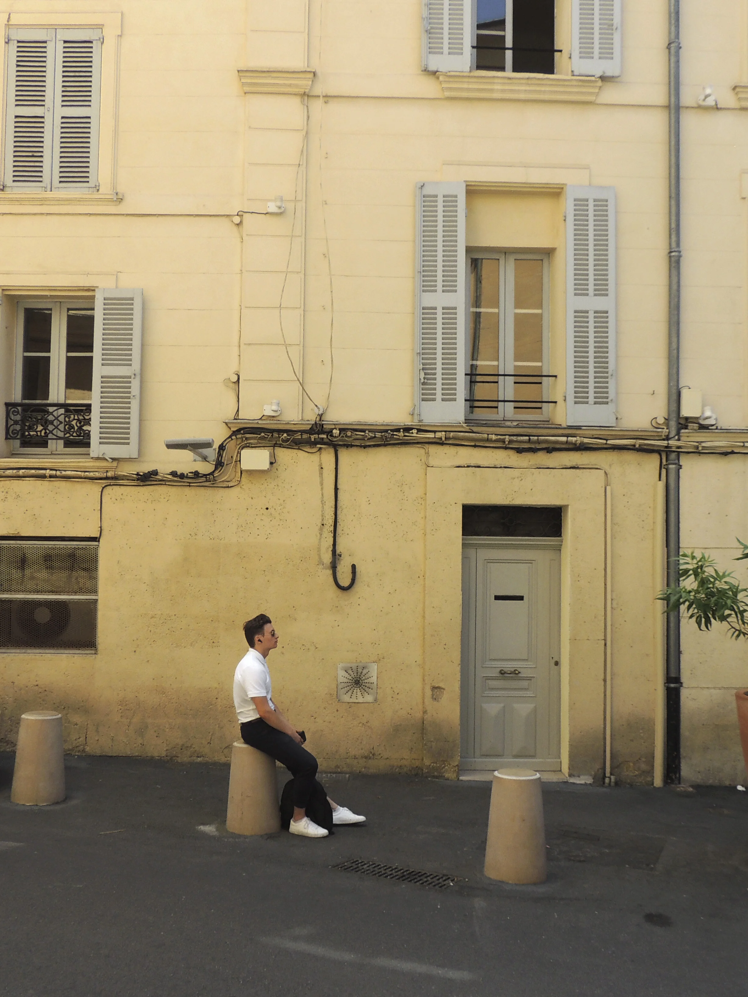 guy sitting in white shirt max.jpg