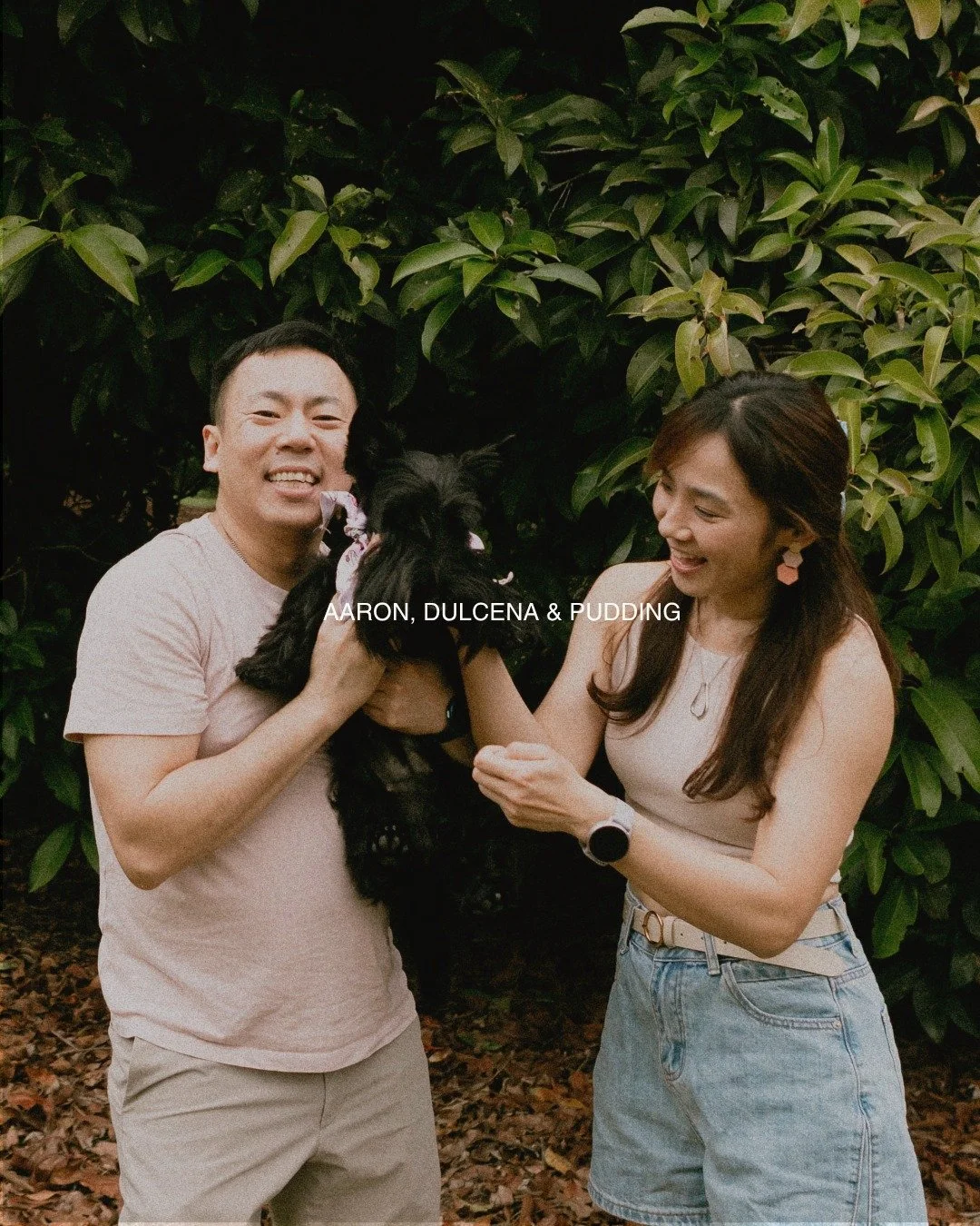 a quiet afternoon, a green pocket of space. 
aaron and dulcena learning each other in small movements. 
pudding spinning joy into the frame. 
the kind of love that looks like ease. 

#houseofphilemon #sgcoupleshoot #singaporephotography #couplesphoto