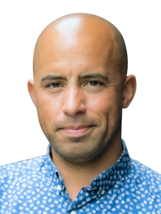 Headshot of Dan Gerrard wearing a blue shirt