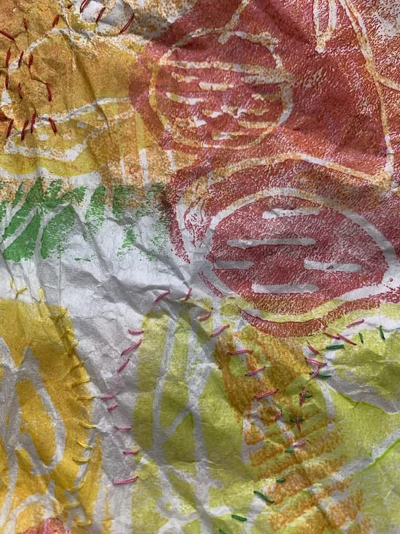 printed and stitched tissue paper