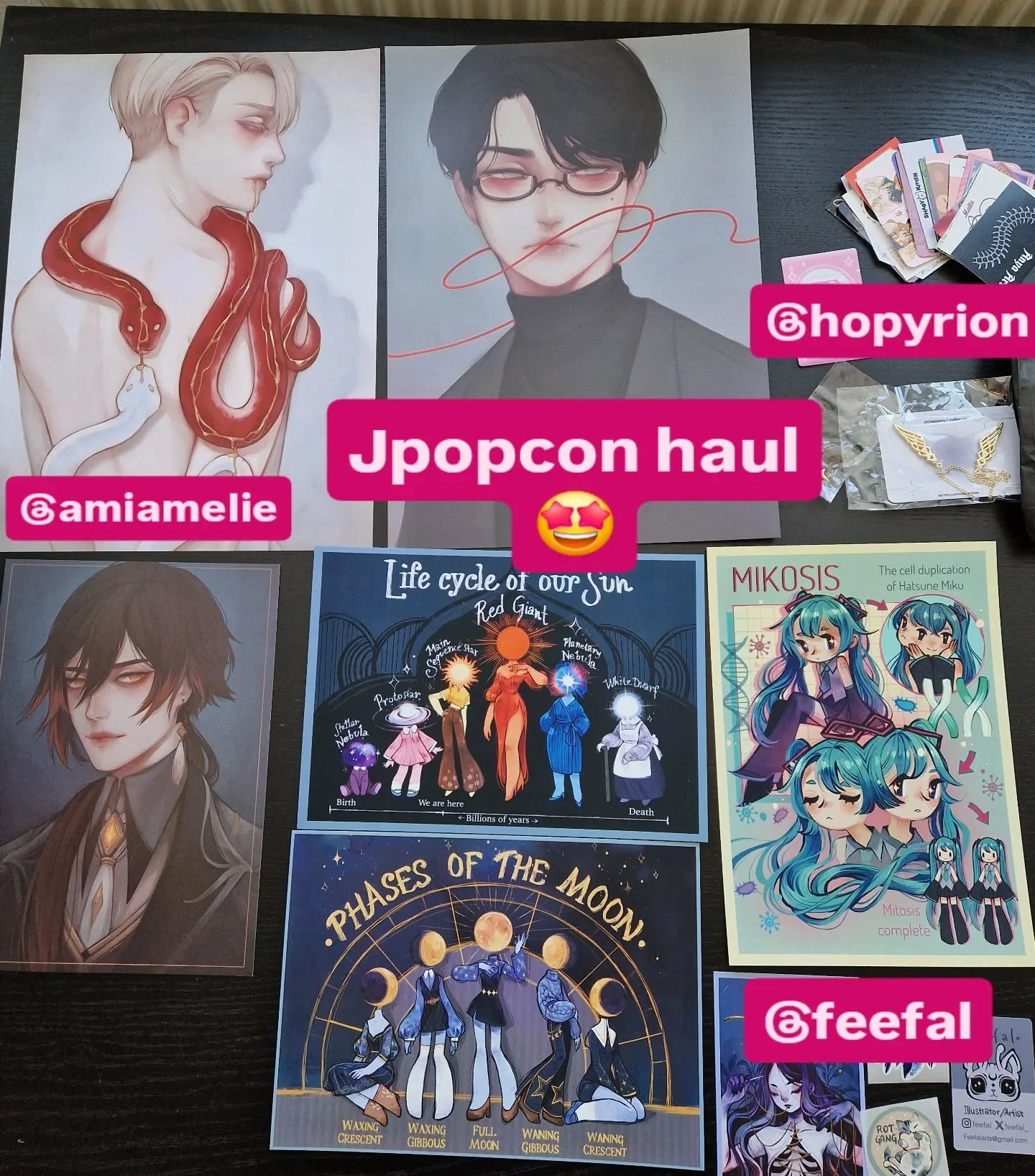 My Jpopcon haul 🤩 I Love the Beautiful Art! I tagged the Artists so you can check them out too 🥳 thanks for a wonderful con experience! 
Can't wait to hang these on my walls! And go through the wonderful business cards to follow even more artists!

