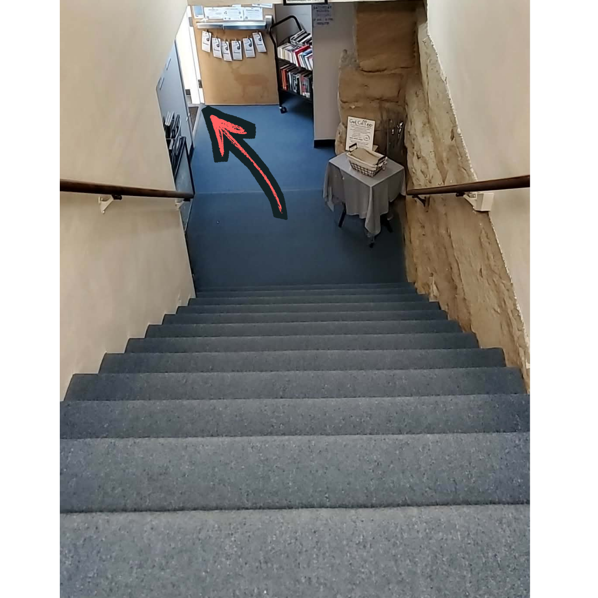 Down the stairs (this is the only way to the bookstore)