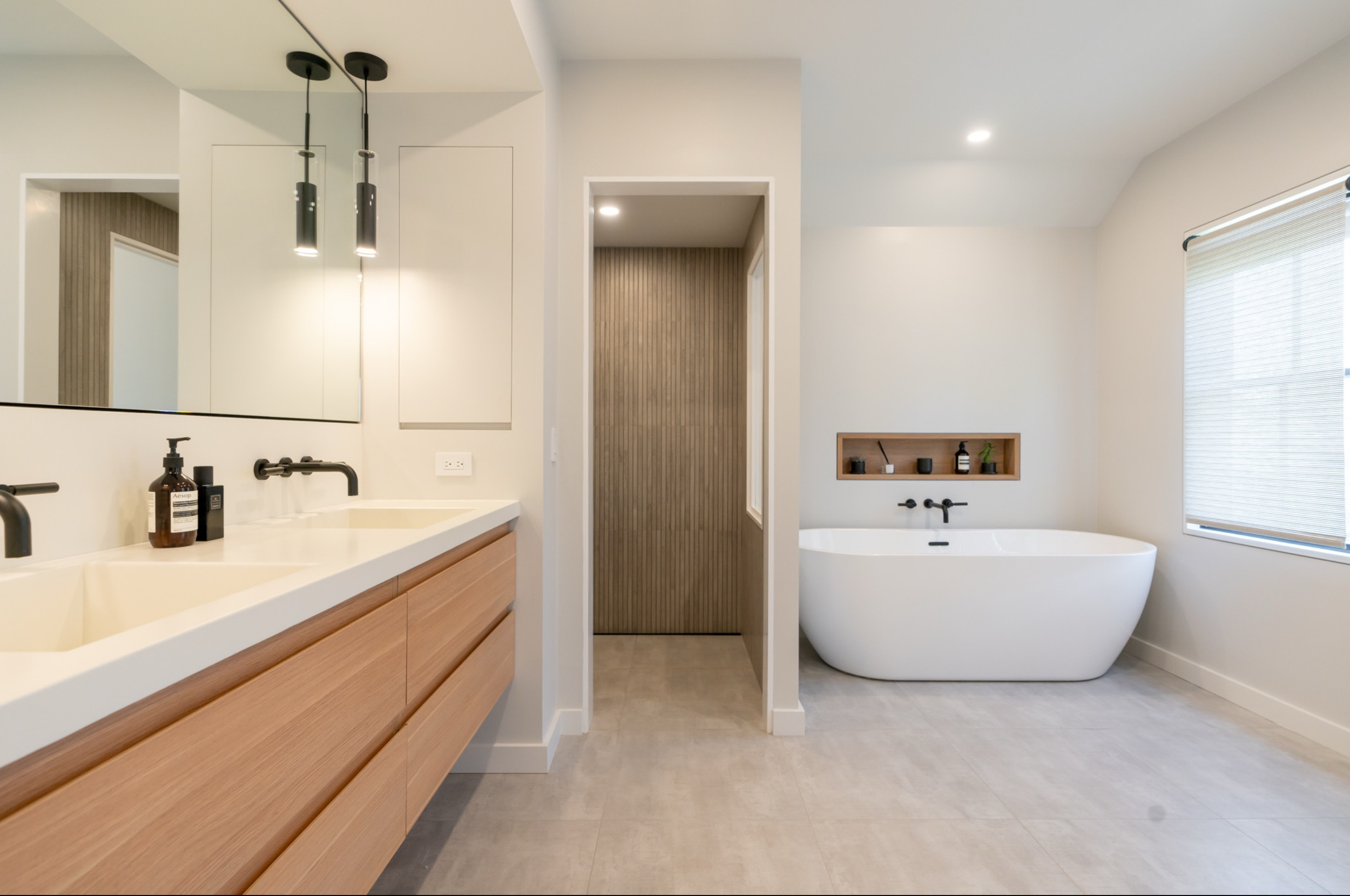 Custom bathroom in downtown Nantucket with walk-in shower and soaking tub
