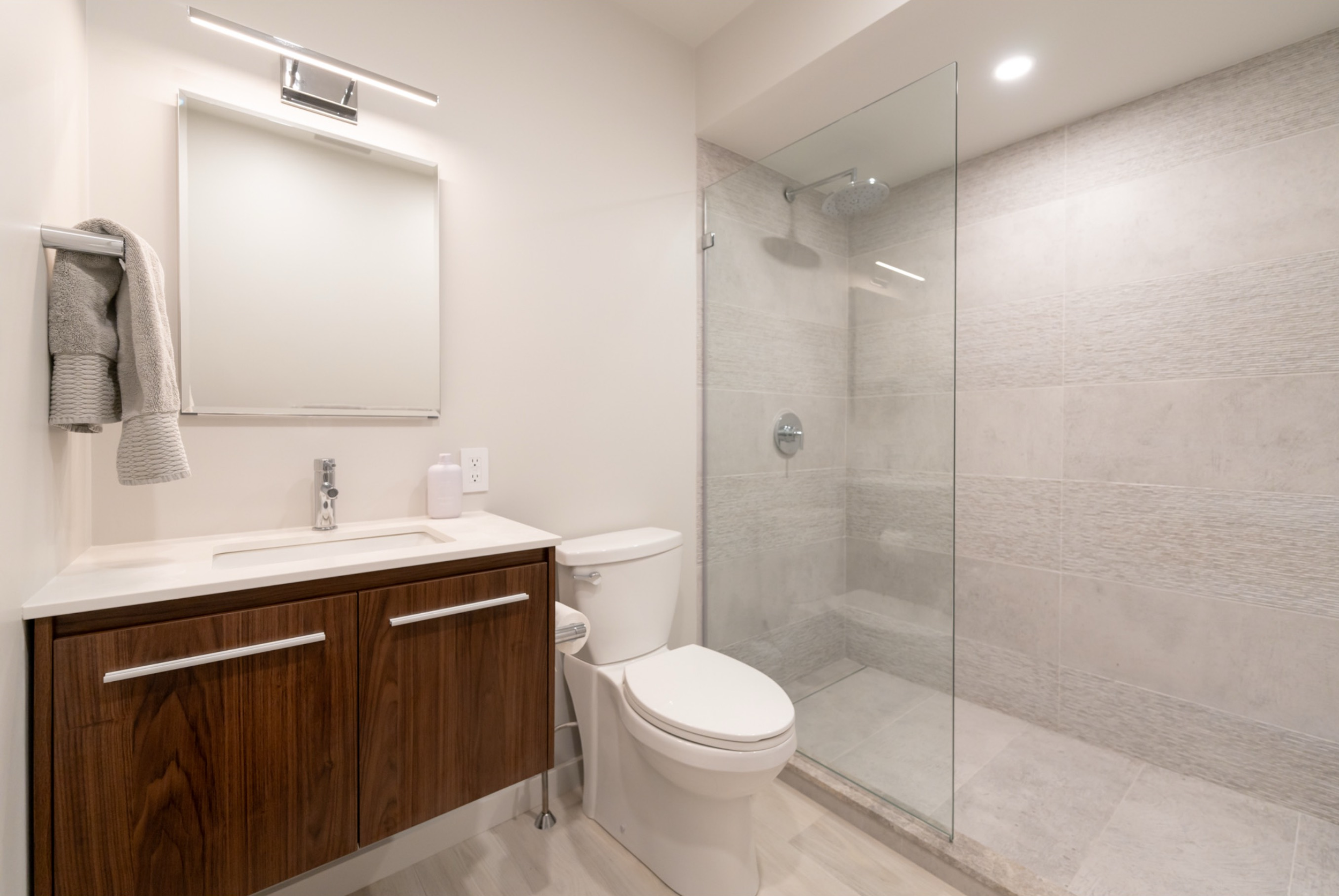 Custom new build guest bathroom in Nantucket by J. Martinson Builders, located in downtown Nantucket