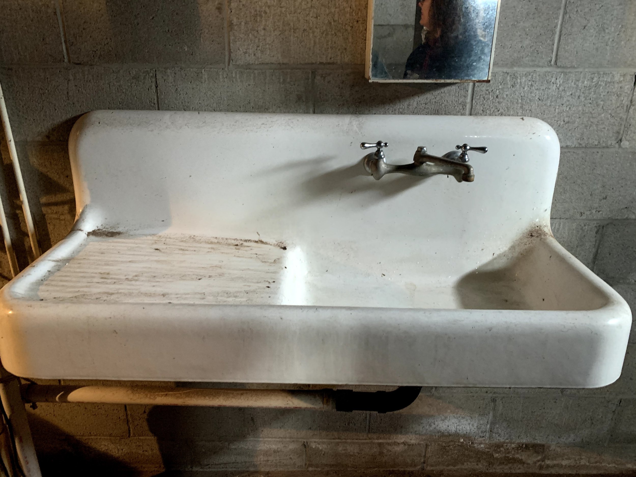 This vintage farmhouse sink was found in the basement. I plan to repurpose it in our mudroom/entryway.