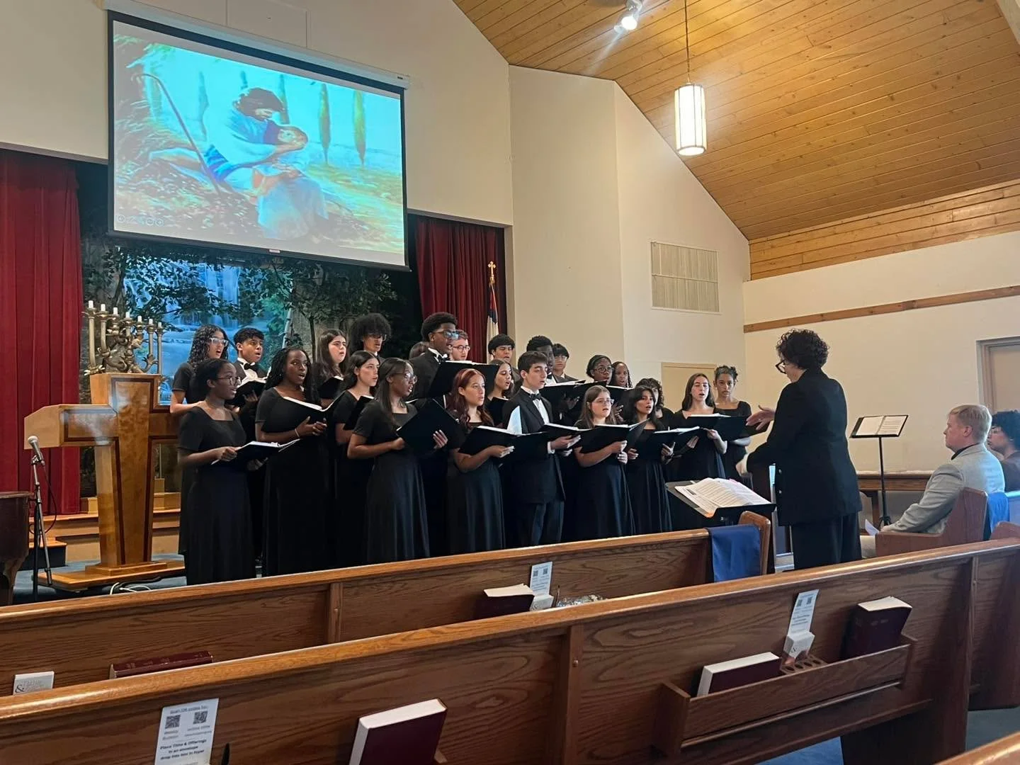 🎶 Il Voc&eacute; visited the Hudson SDA Church last Sabbath and was so thankful for the generosity and warm welcome shown to them! 🙏💛
During the service, Cheri Drew, SLA&rsquo;s assistant treasurer, was recognized and honored for all she does for 
