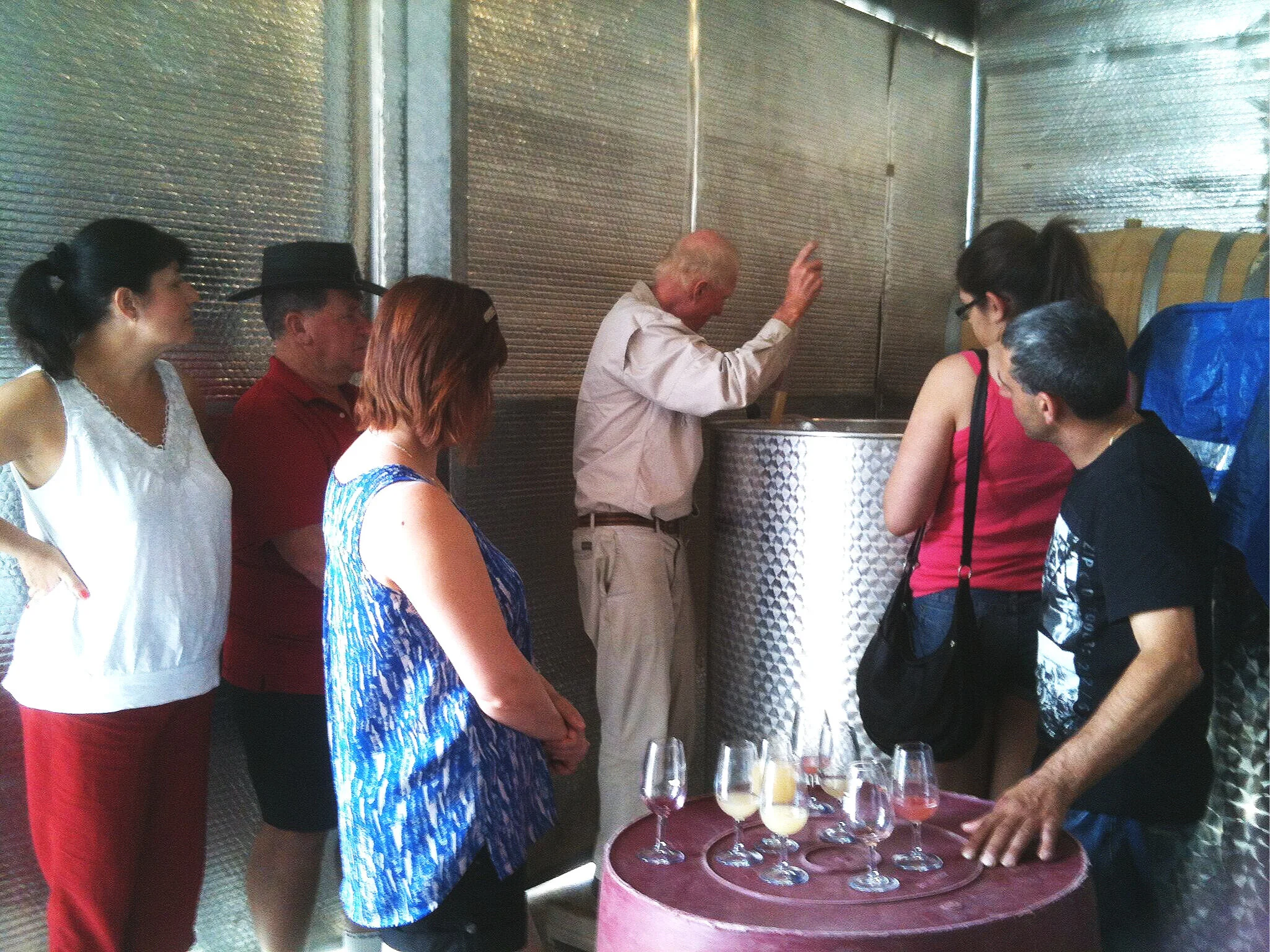 Greg Showing Wine Shed During a Vineyard Tasting.png